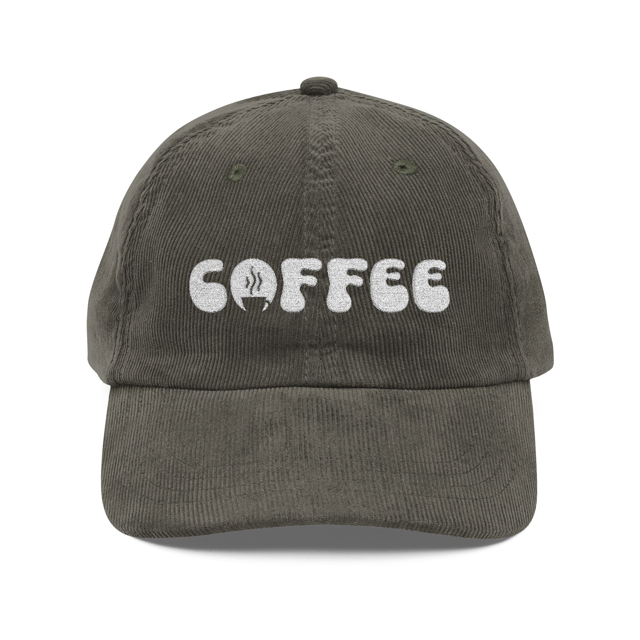 A dark grey corduroy dad hat with the word COFFEE embroidered in white on the front.