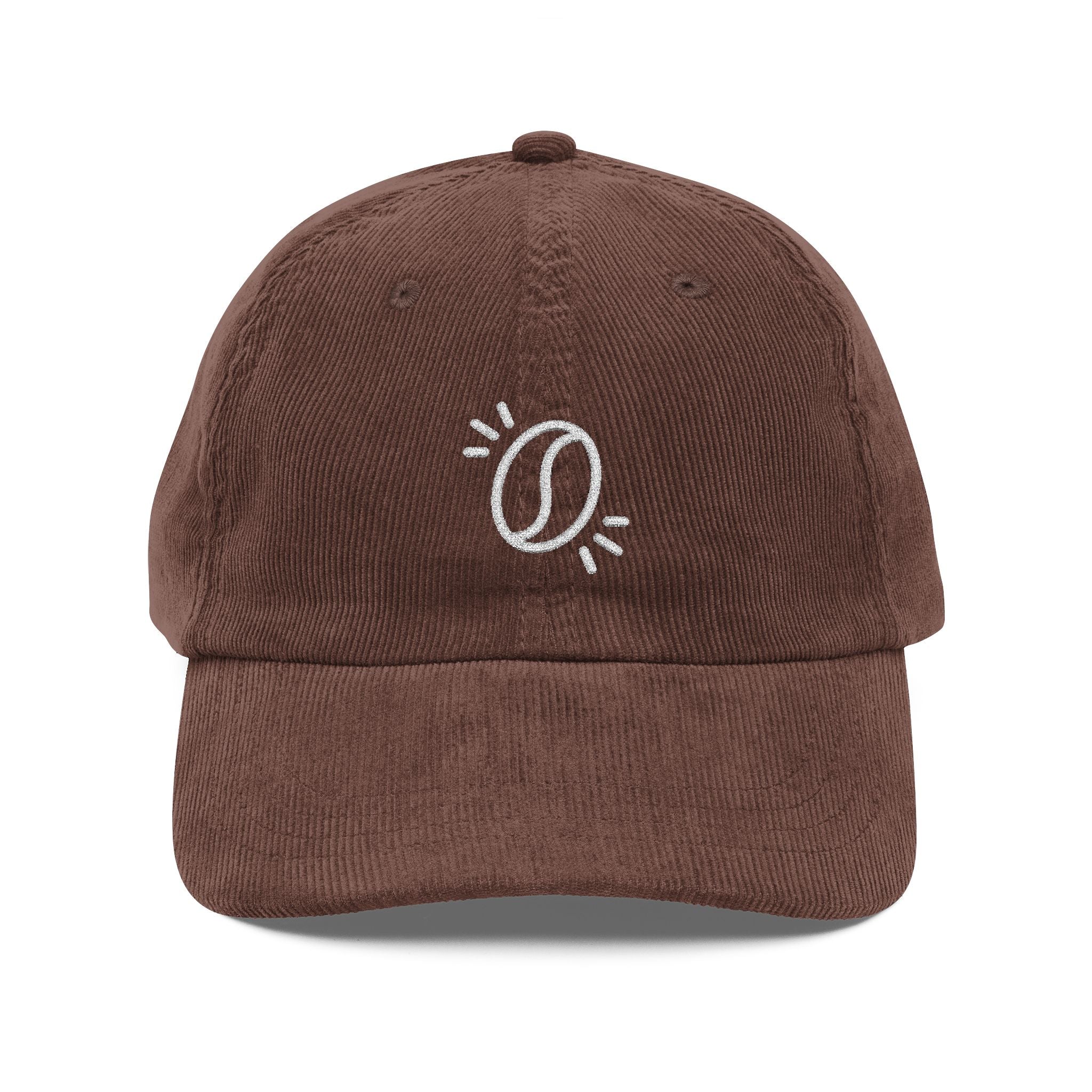A brown corduroy dad hat featuring an embroidered white coffee bean icon on the front.