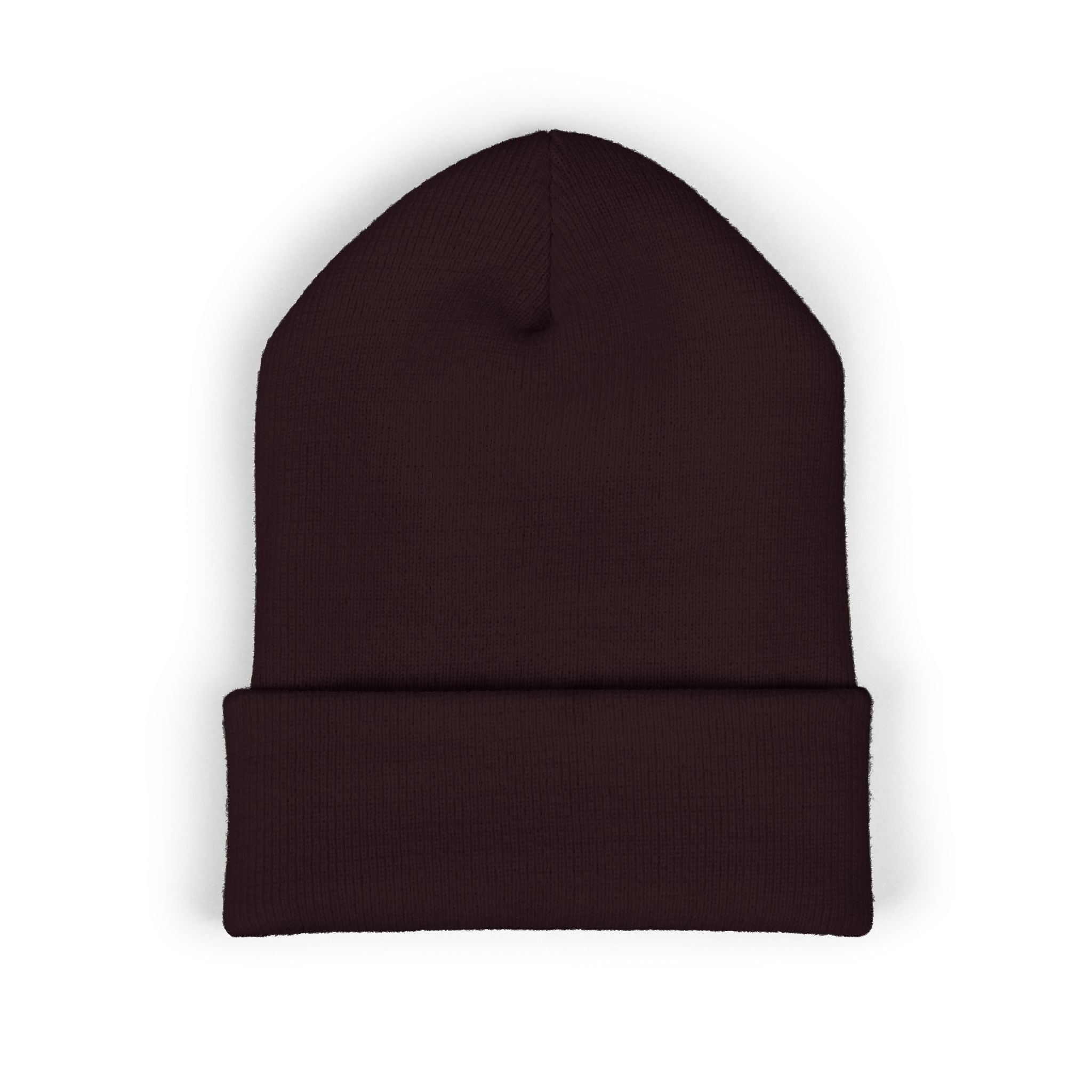 A dark brown knitted cuffed beanie.