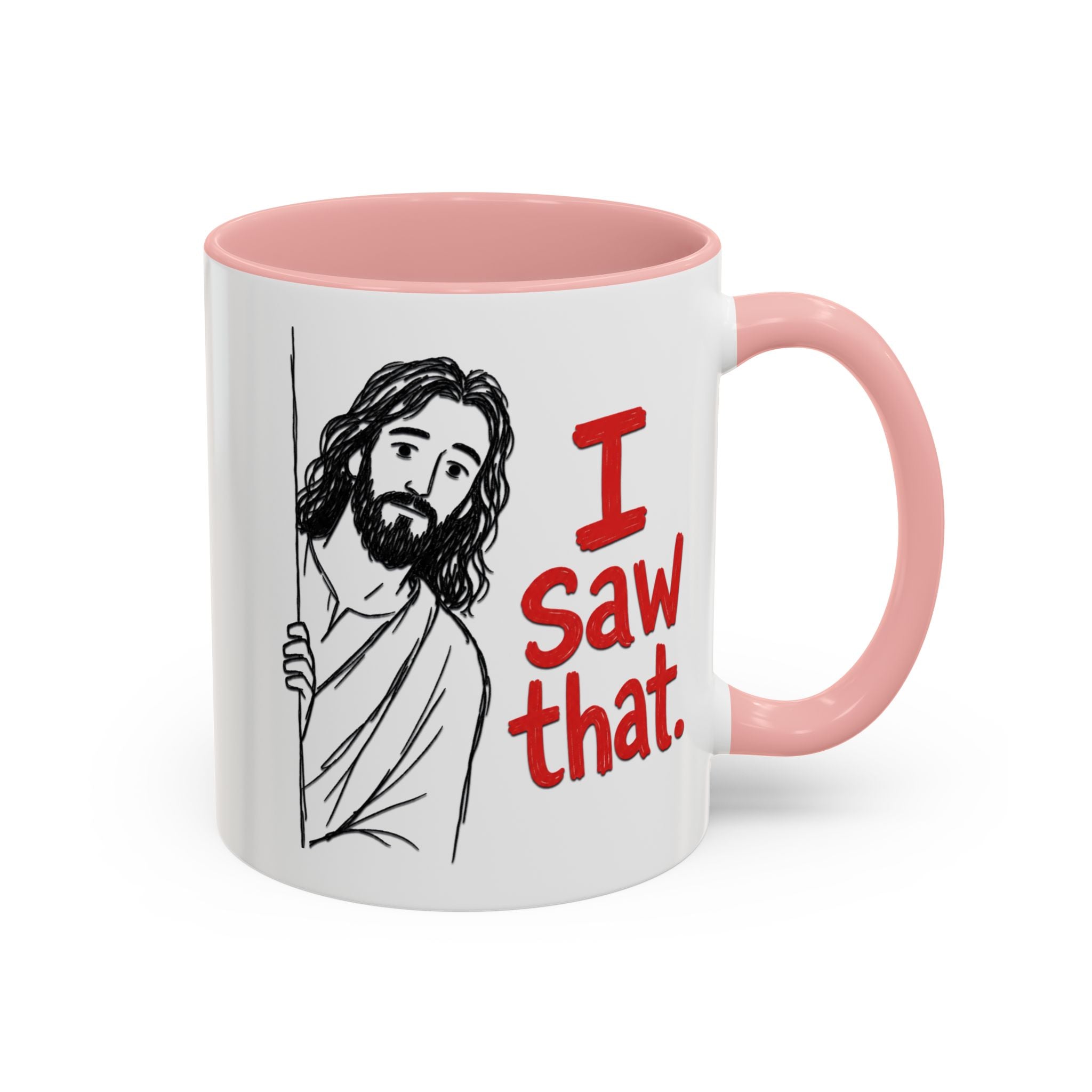 White ceramic mug with a pink handle and interior, featuring a drawing of Jesus and the text I Saw