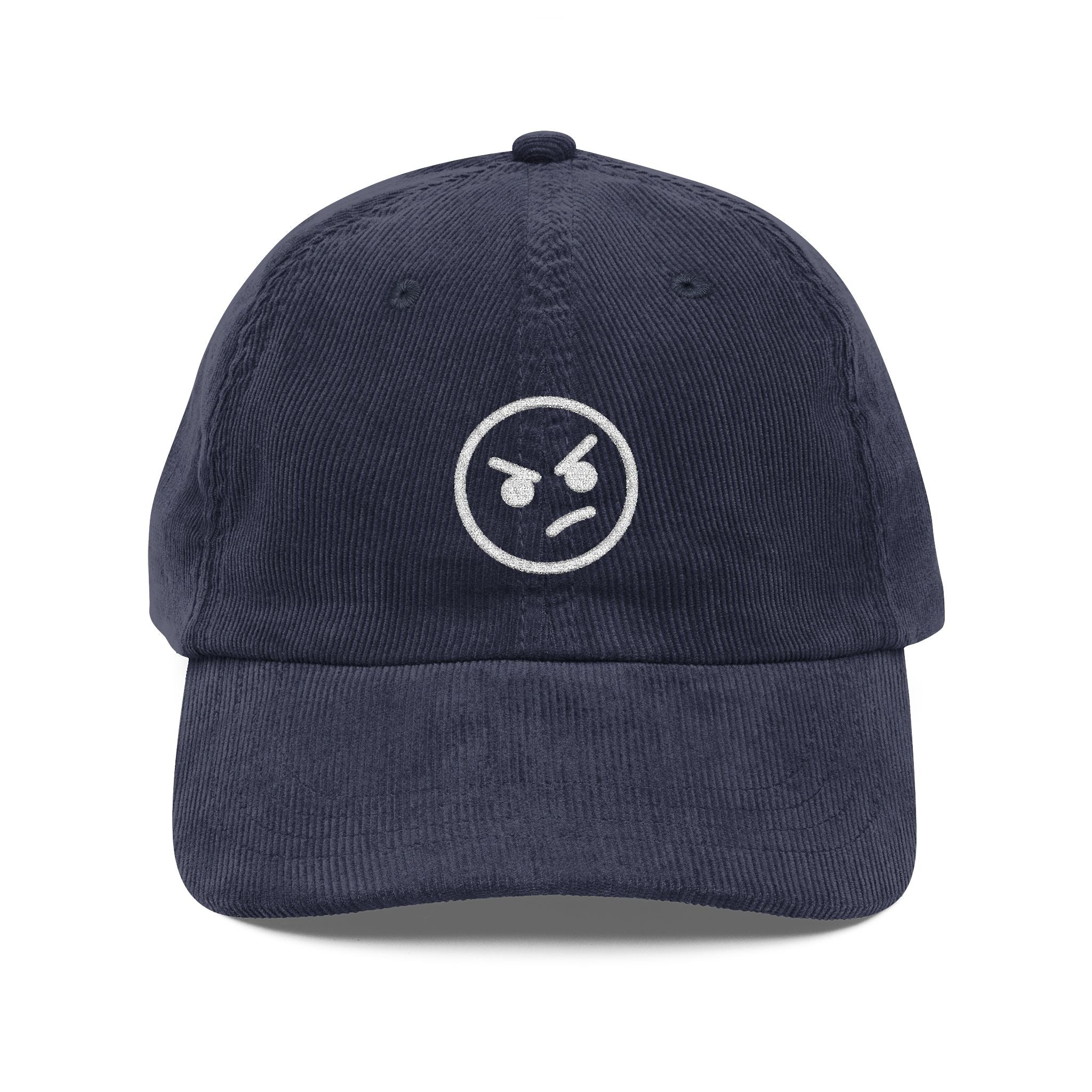 A navy blue corduroy dad hat featuring an embroidered white angry face emoji on the front.