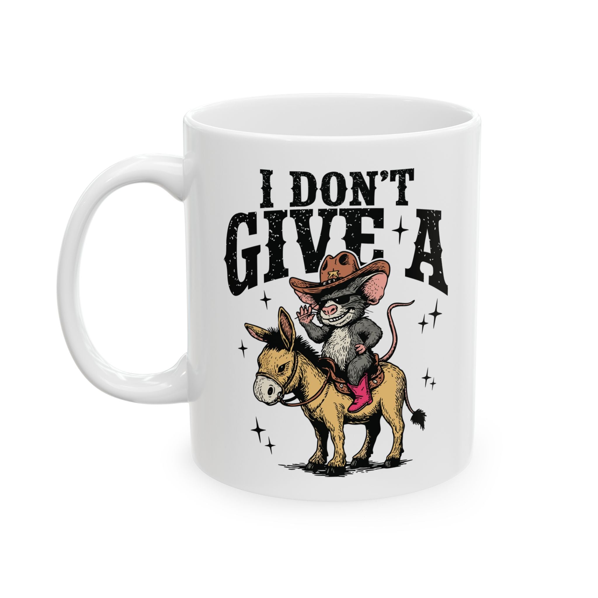 White ceramic coffee mug featuring a cartoon mouse in a cowboy hat riding a donkey.
