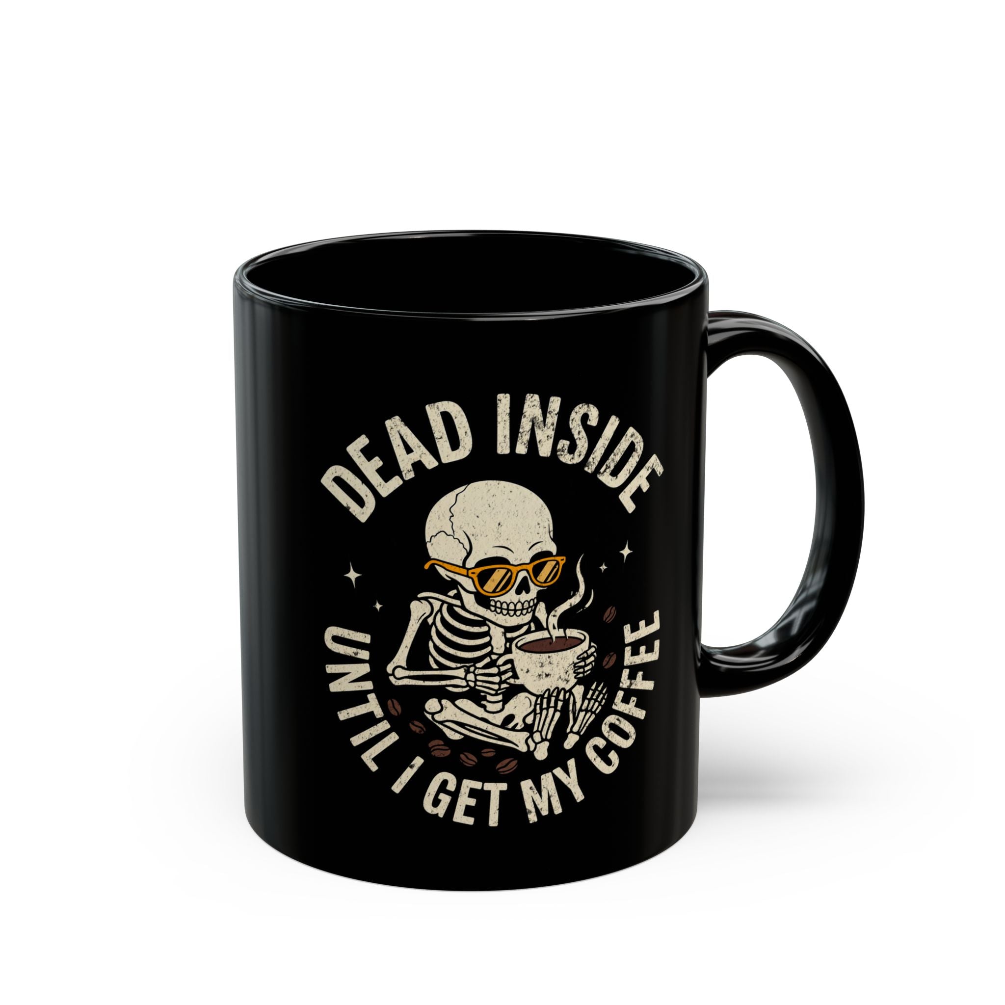 Black ceramic mug featuring a skeleton wearing sunglasses and holding a steaming cup of coffee.