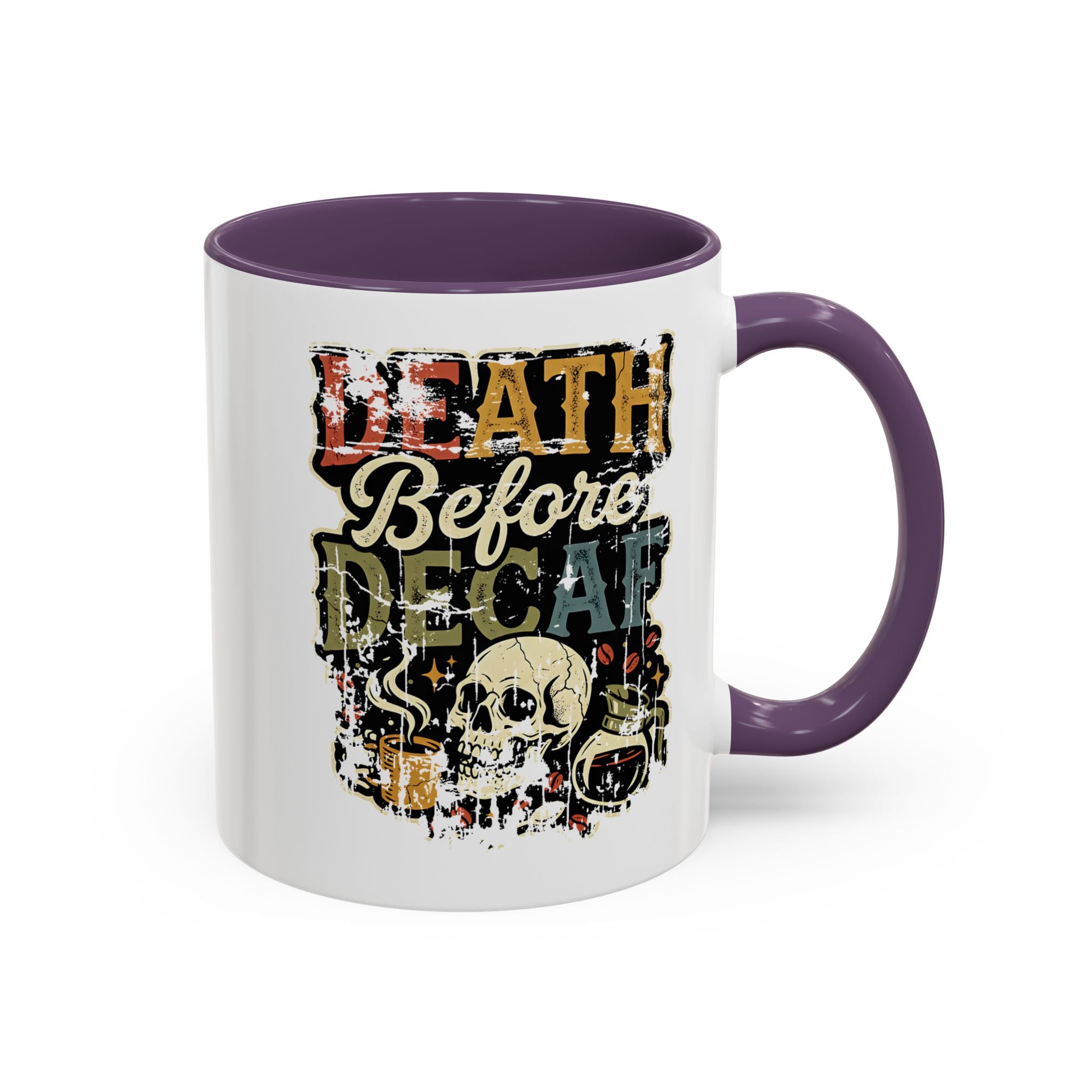 White ceramic coffee mug with a purple handle and a retro skull graphic reading Death Before Decaf.