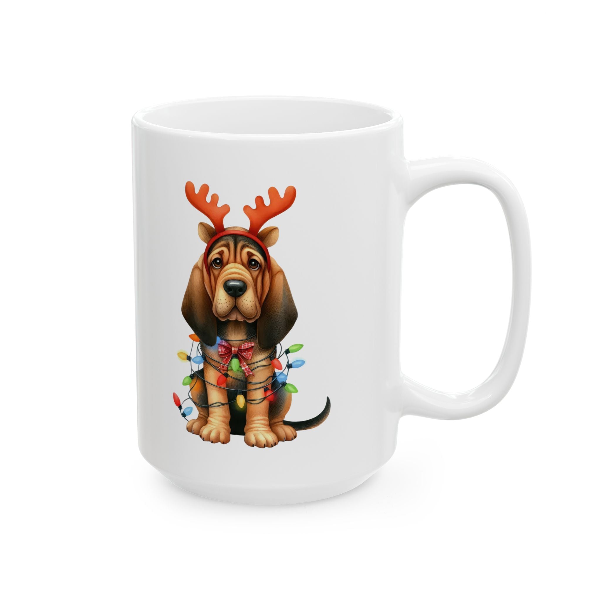 A white ceramic mug features a bloodhound wearing reindeer antlers and Christmas lights.