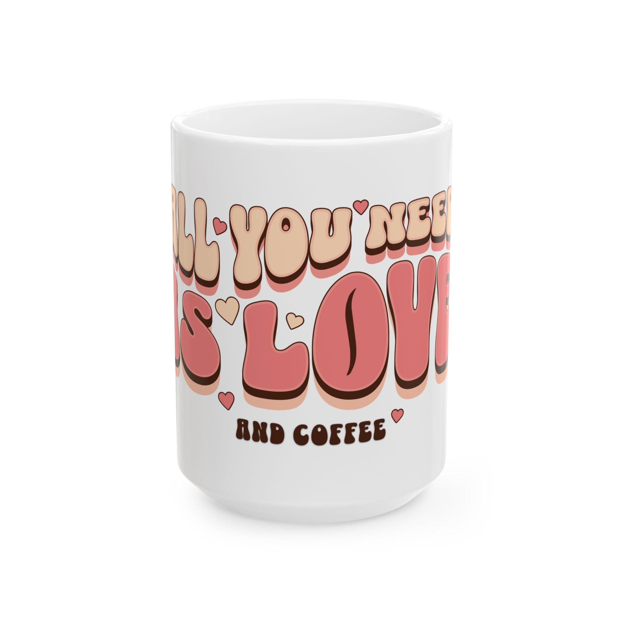 A white ceramic mug featuring retro bubble lettering that reads All You Need Is Love and Coffee.
