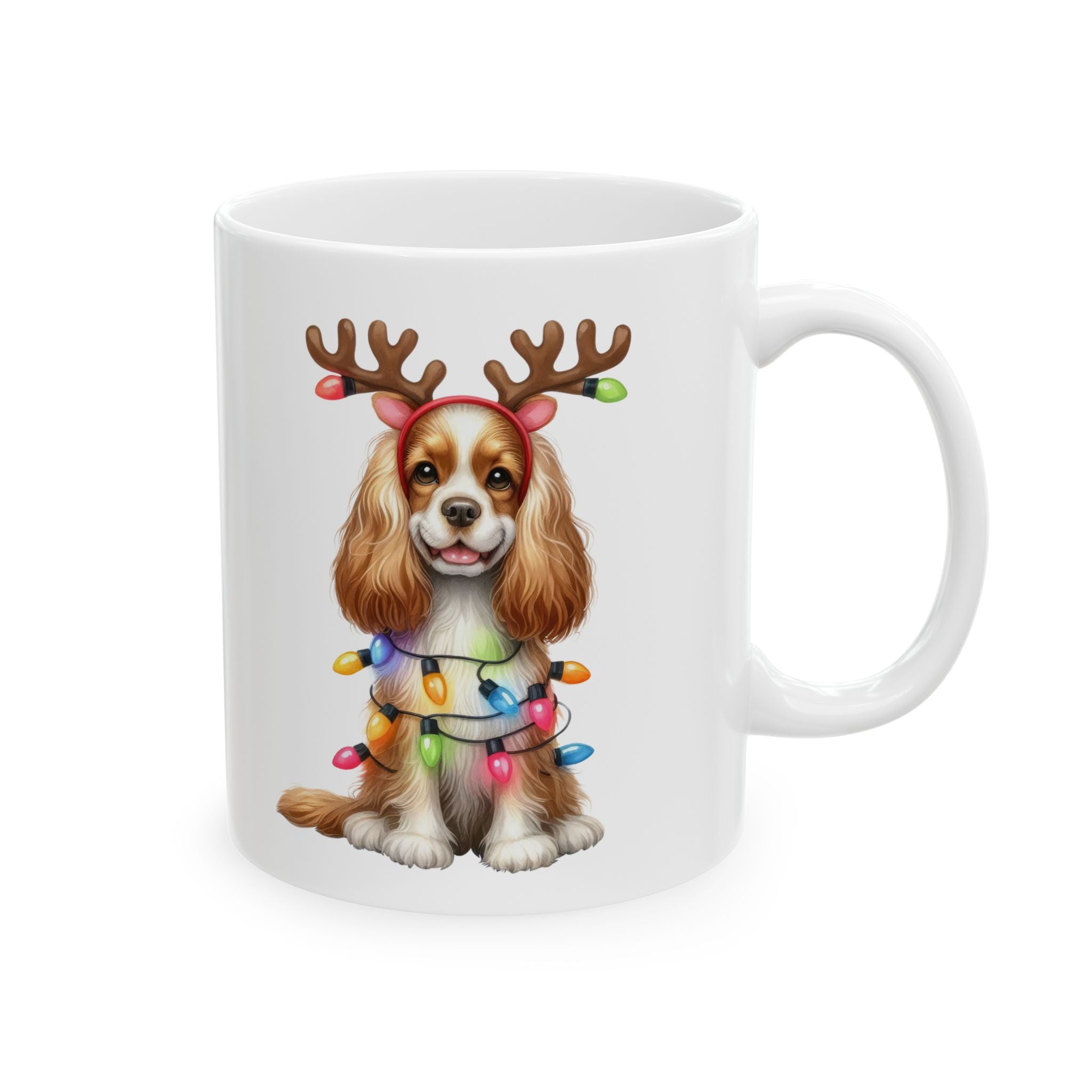 White ceramic mug featuring an American Cocker Spaniel wearing reindeer antlers and Christmas lights.
