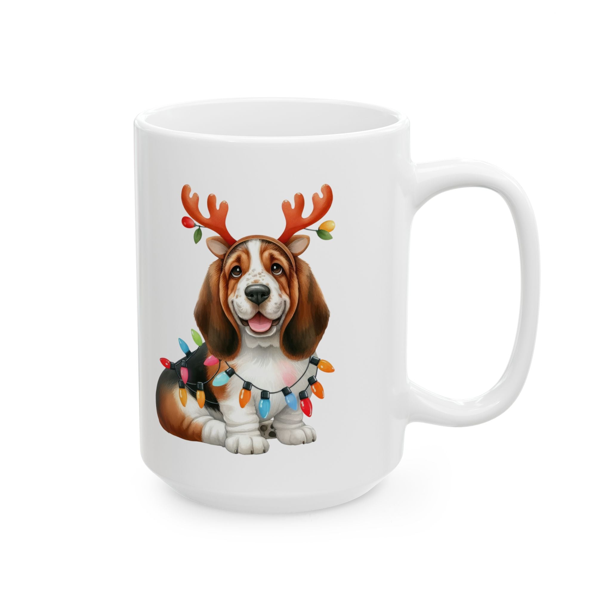 A white ceramic mug features a basset hound wearing reindeer antlers and Christmas lights.
