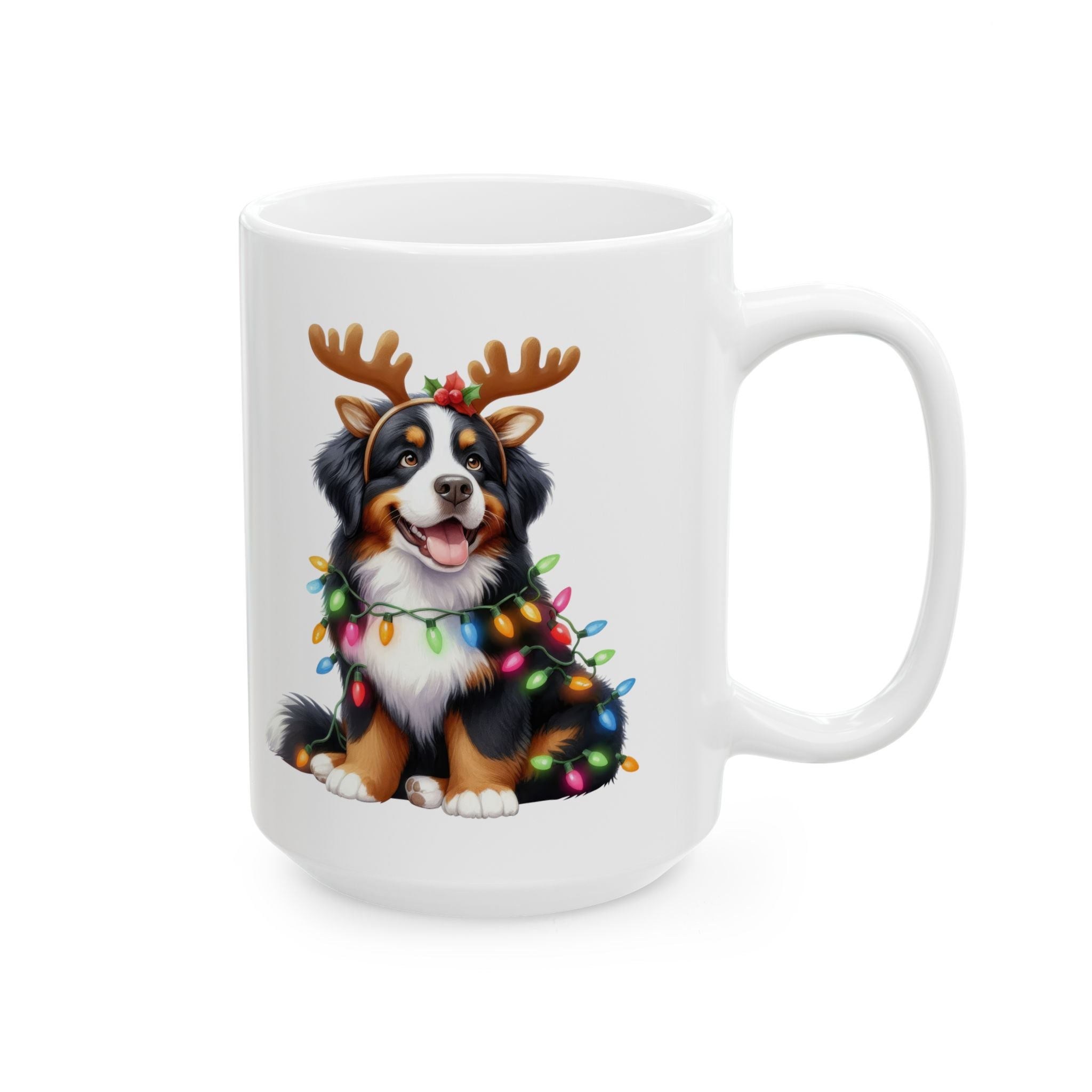 White ceramic mug featuring a Bernese Mountain Dog wearing reindeer antlers and Christmas lights.
