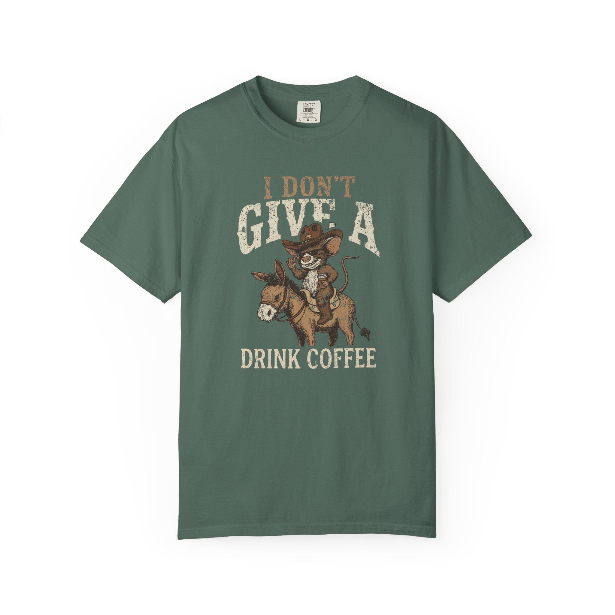 Green unisex t-shirt with a distressed graphic of a cowboy rat riding a donkey holding coffee.