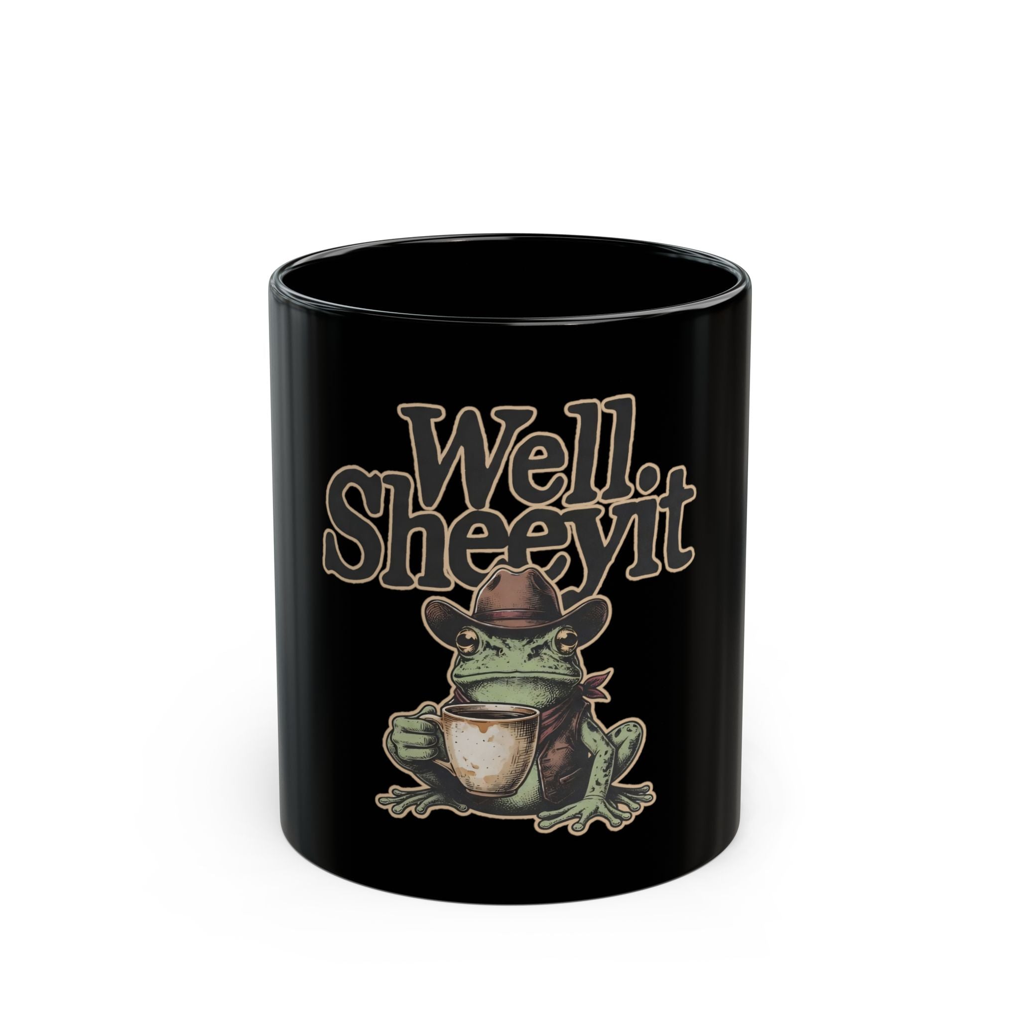 Black ceramic mug featuring a cowboy frog holding a coffee cup with the text Well Sheeyit.