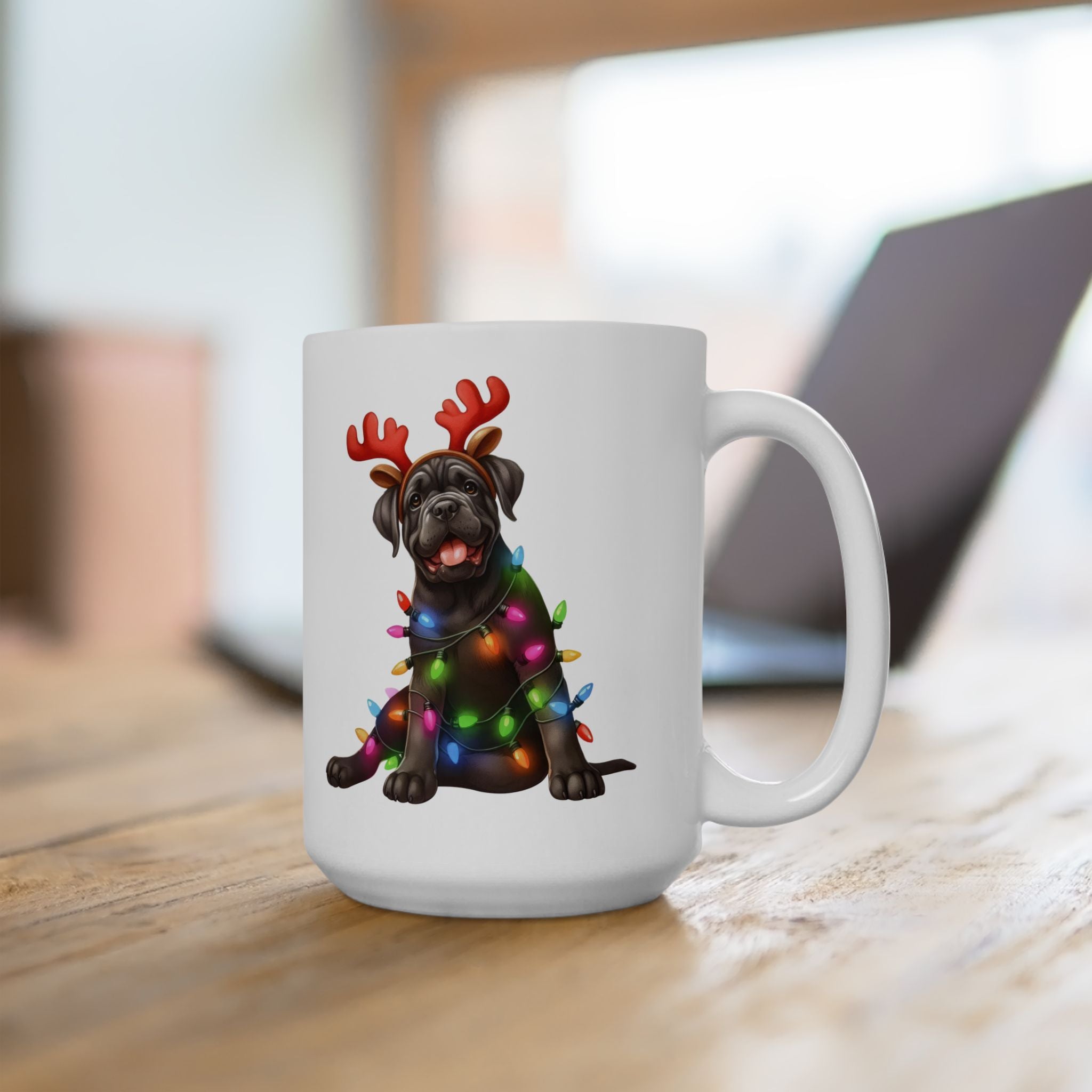 White ceramic mug featuring a Cane Corso puppy with reindeer antlers and Christmas lights.