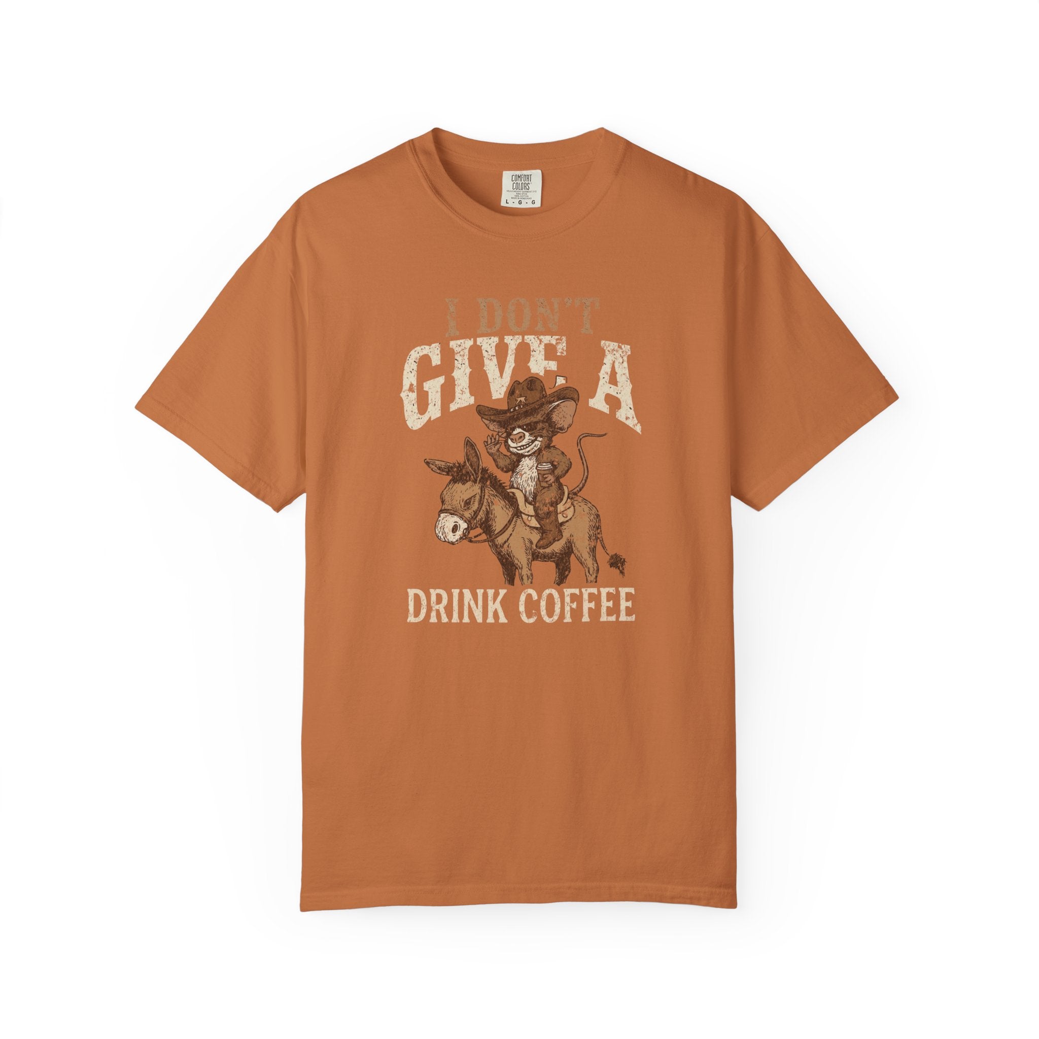 Rust-colored unisex t-shirt with a distressed graphic of a rat in a cowboy hat riding a donkey.