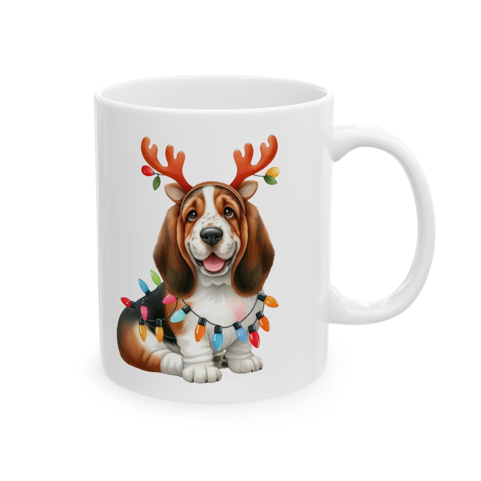 White ceramic mug with a Basset Hound wearing reindeer antlers and Christmas lights.