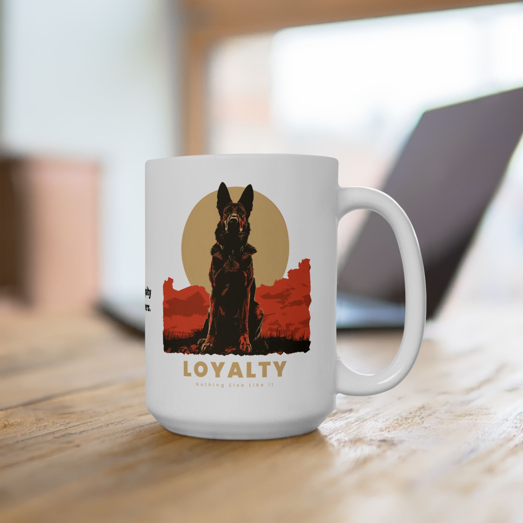 White ceramic mug featuring a German Shepherd illustration and the word LOYALTY on a wooden desk.