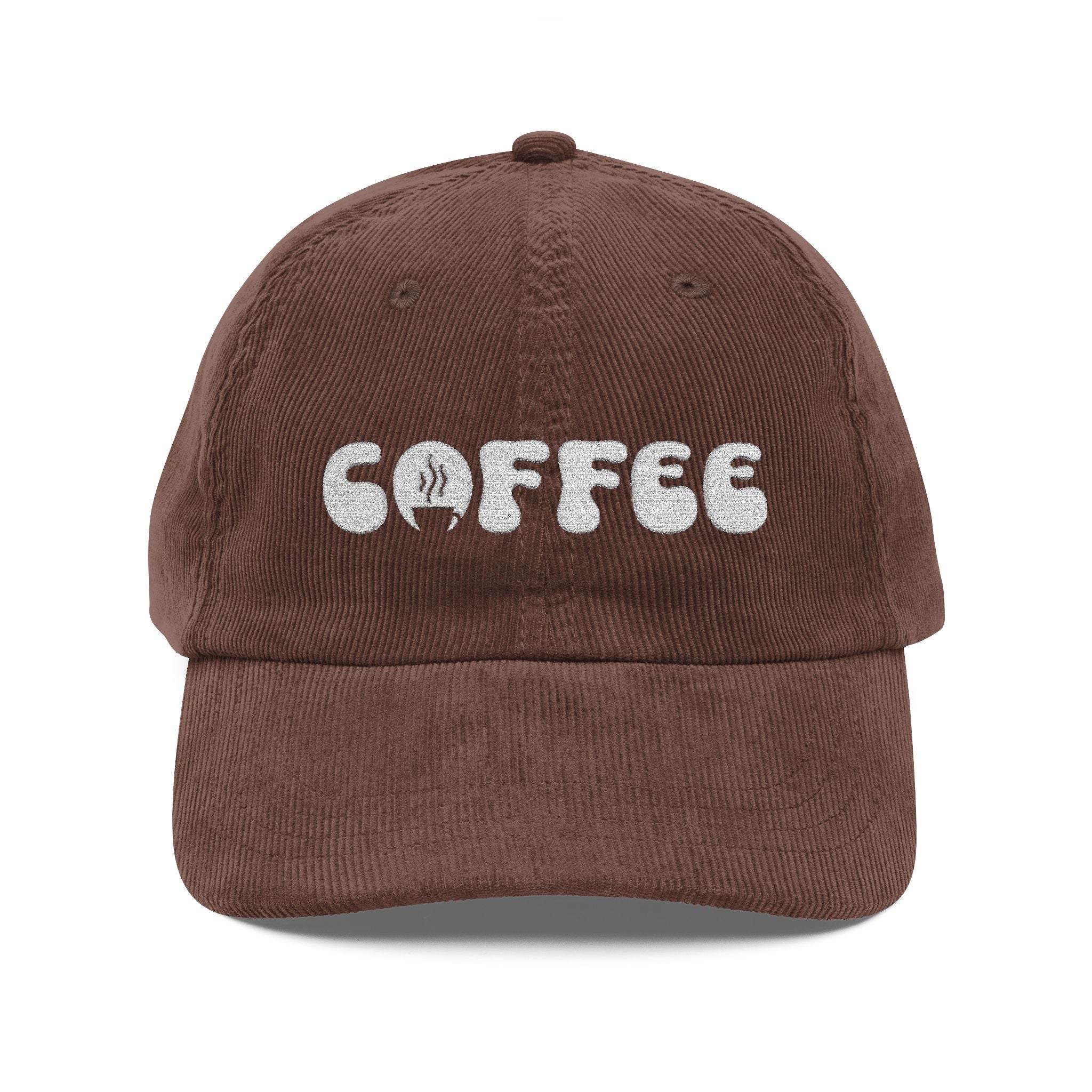 A brown corduroy dad hat with the word coffee embroidered in white on the front.