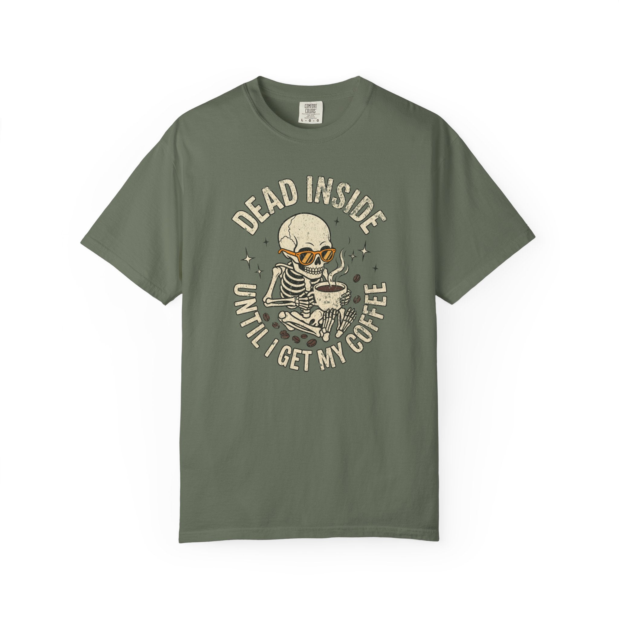 Olive green t-shirt featuring a skeleton wearing sunglasses and holding a steaming coffee mug.