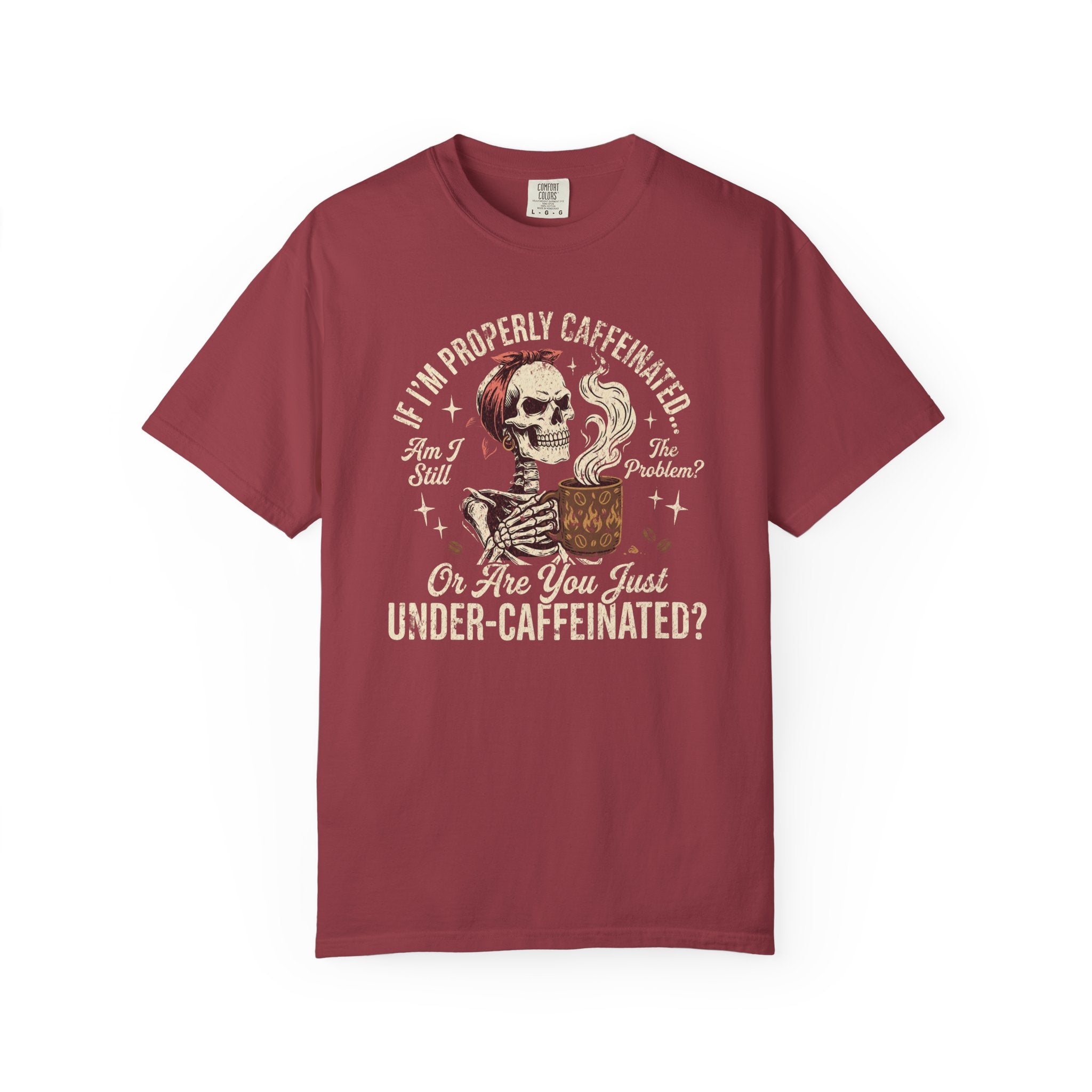 Red t-shirt featuring a graphic of a skeleton wearing a headband and holding a steaming coffee mug.