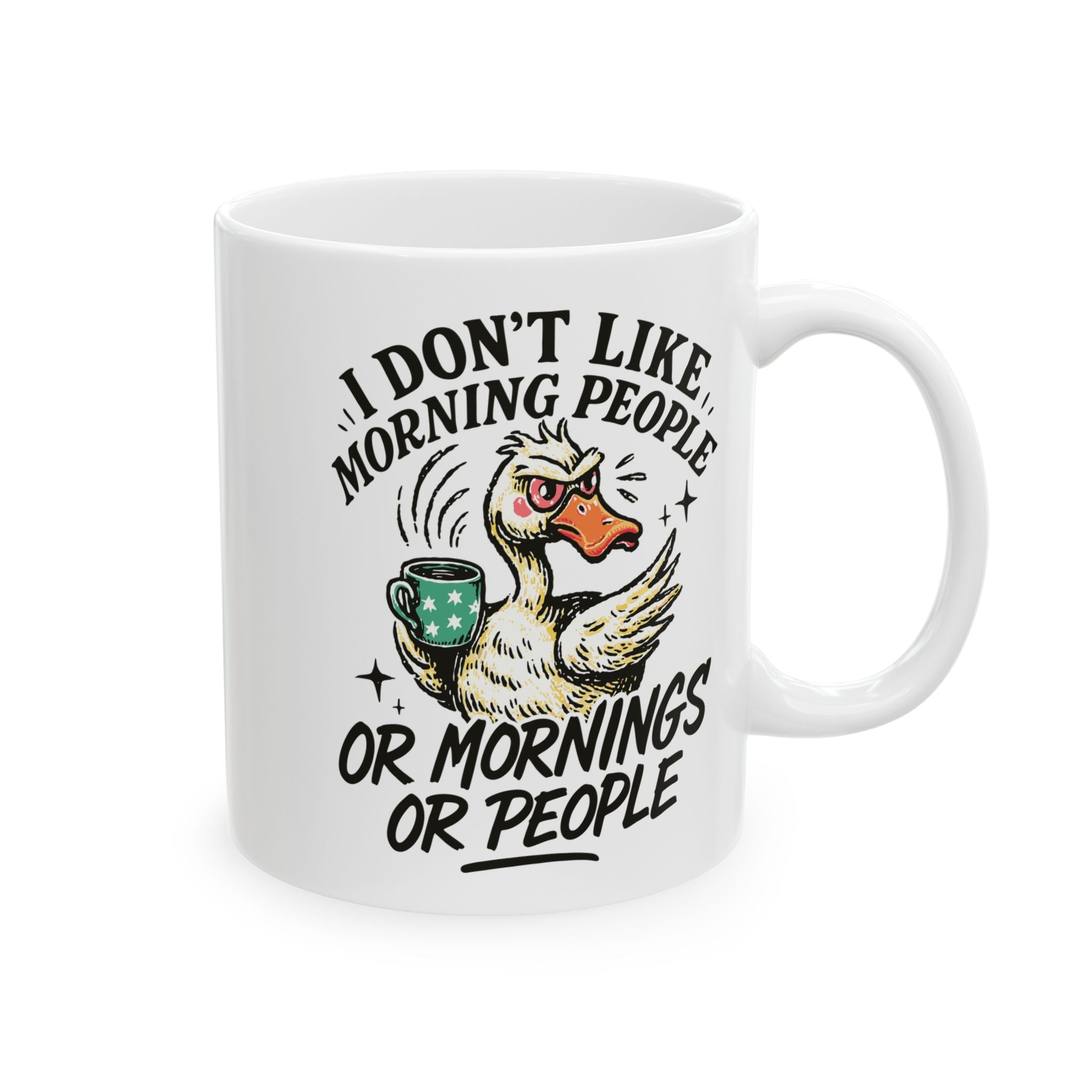 White ceramic coffee mug featuring a grumpy duck holding a mug with the text about hating mornings.