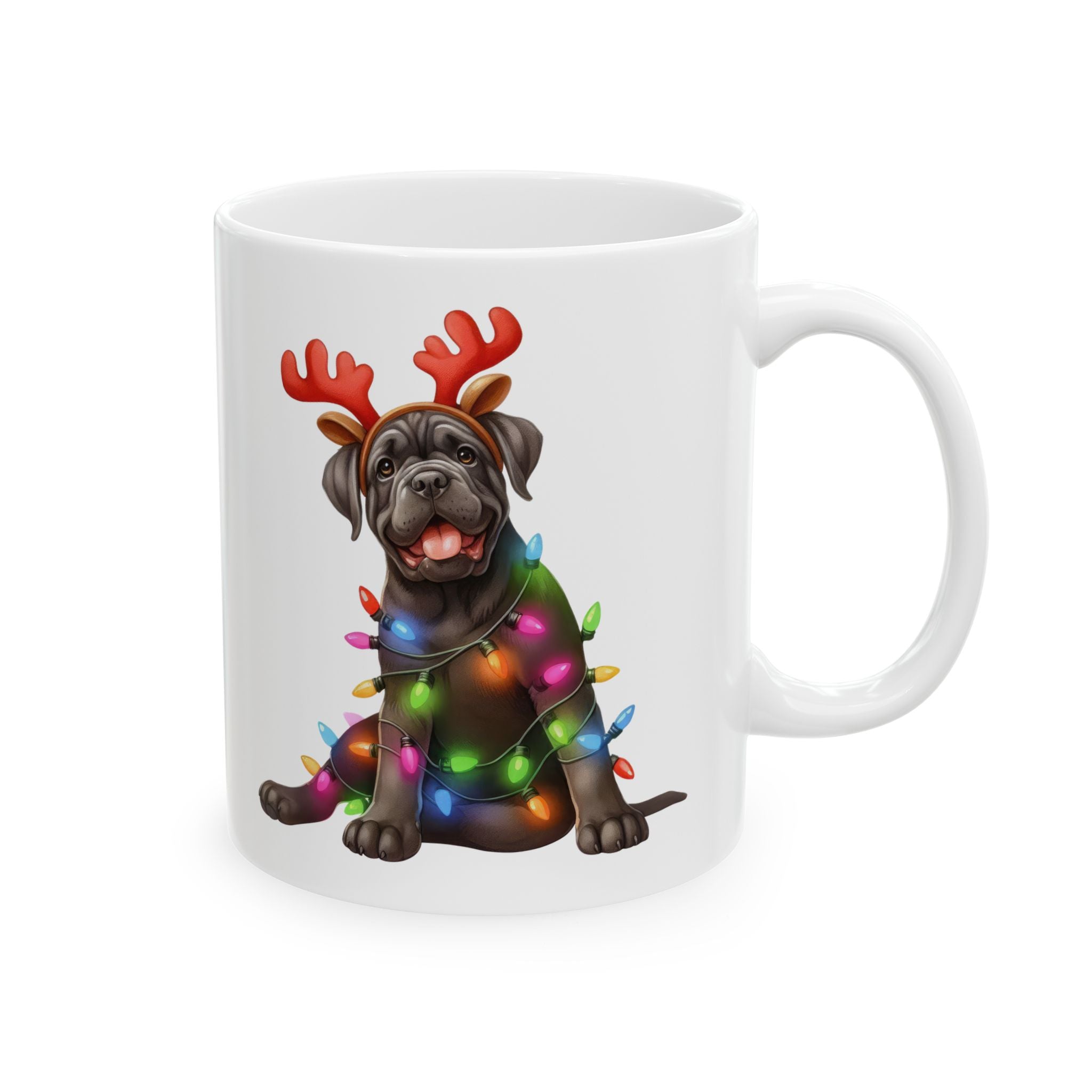 A white ceramic mug features a Cane Corso puppy wearing reindeer antlers and Christmas lights.