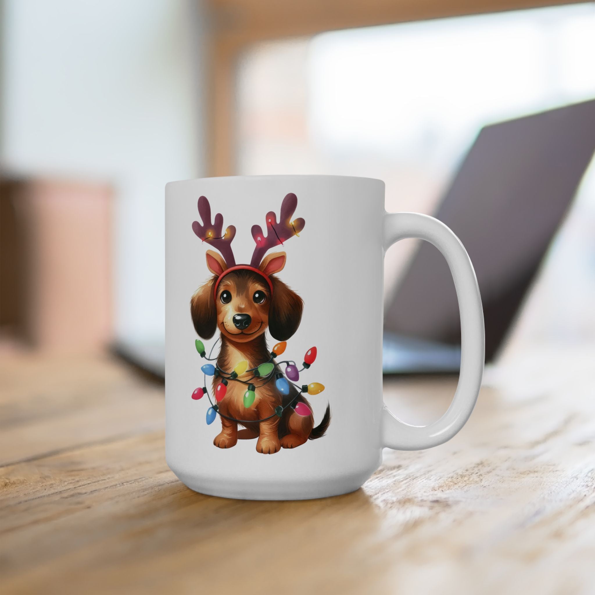 White ceramic mug with a festive dachshund wearing reindeer antlers and Christmas lights.