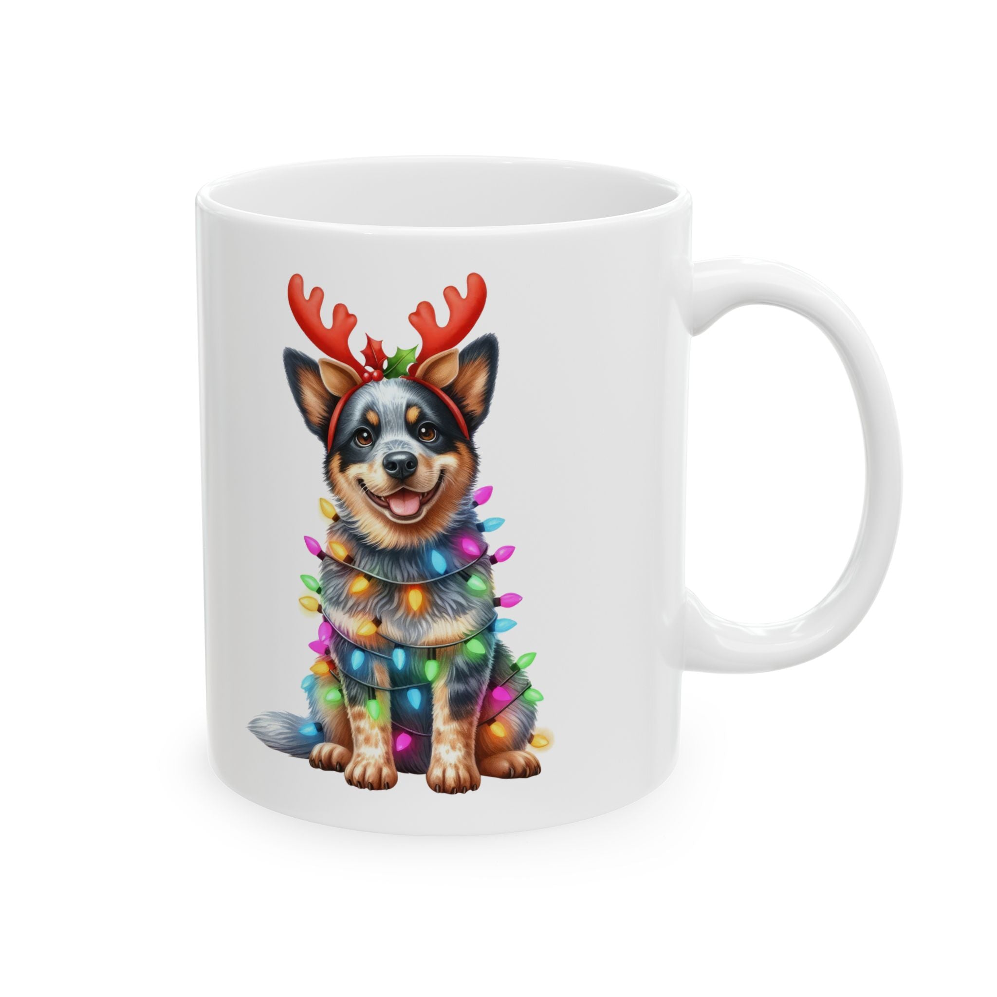 White ceramic mug featuring an Australian Cattle Dog wearing reindeer antlers and Christmas lights.
