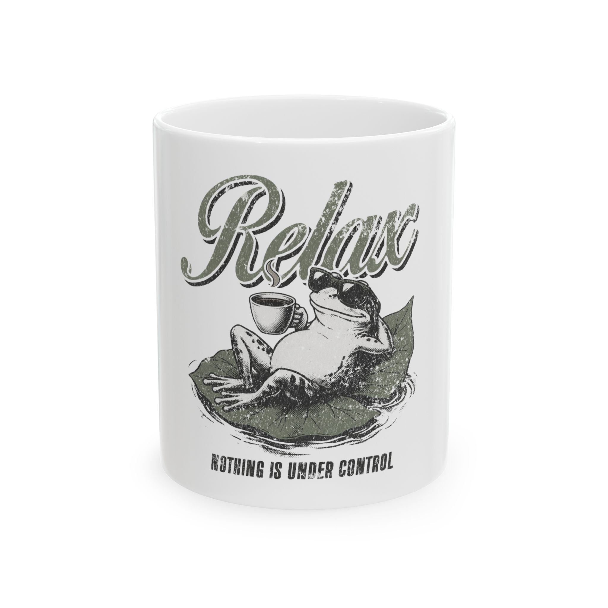 White ceramic mug featuring a graphic of a frog wearing sunglasses, relaxing on a lily pad.