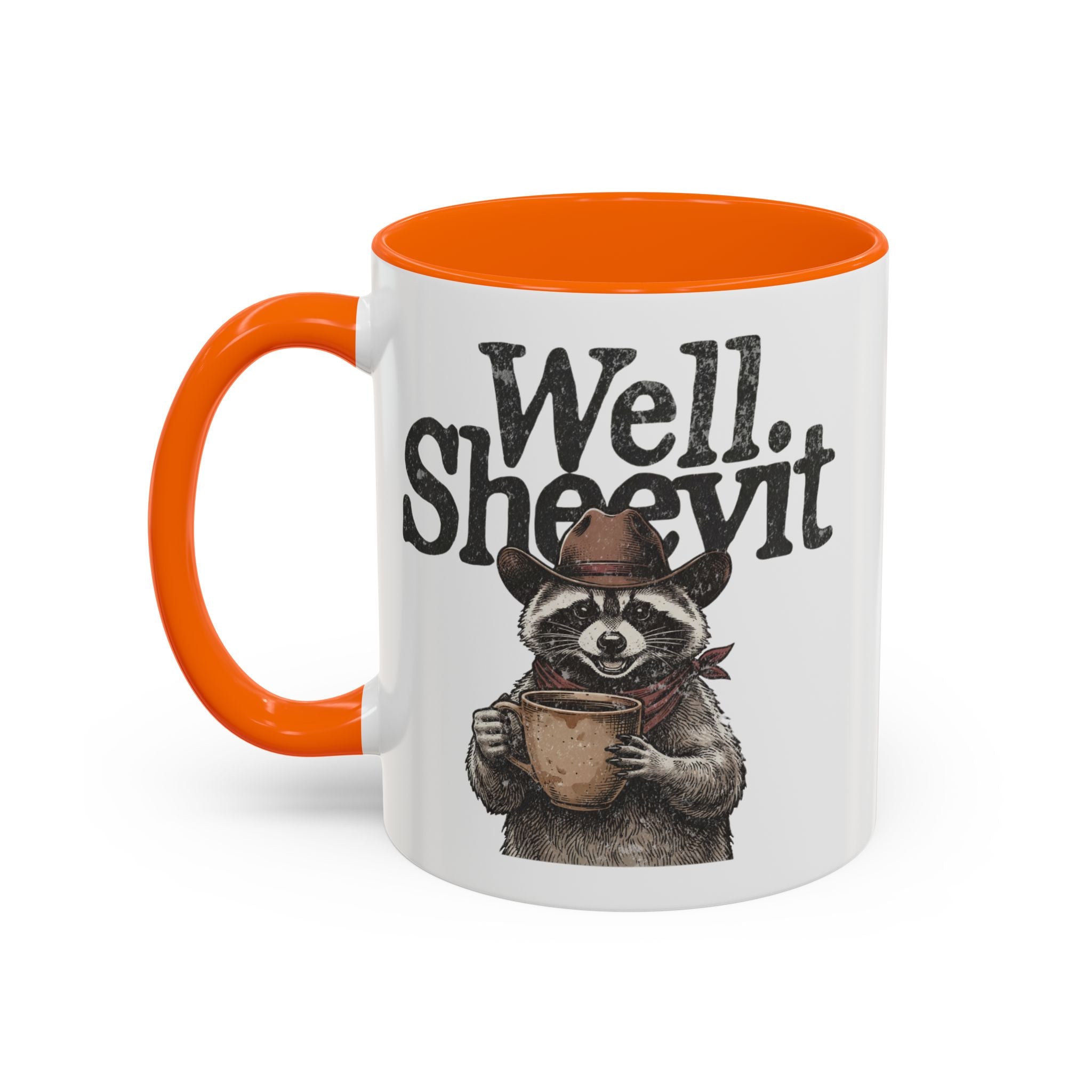 White ceramic mug with an orange handle and rim, featuring a raccoon in a cowboy hat holding a mug.