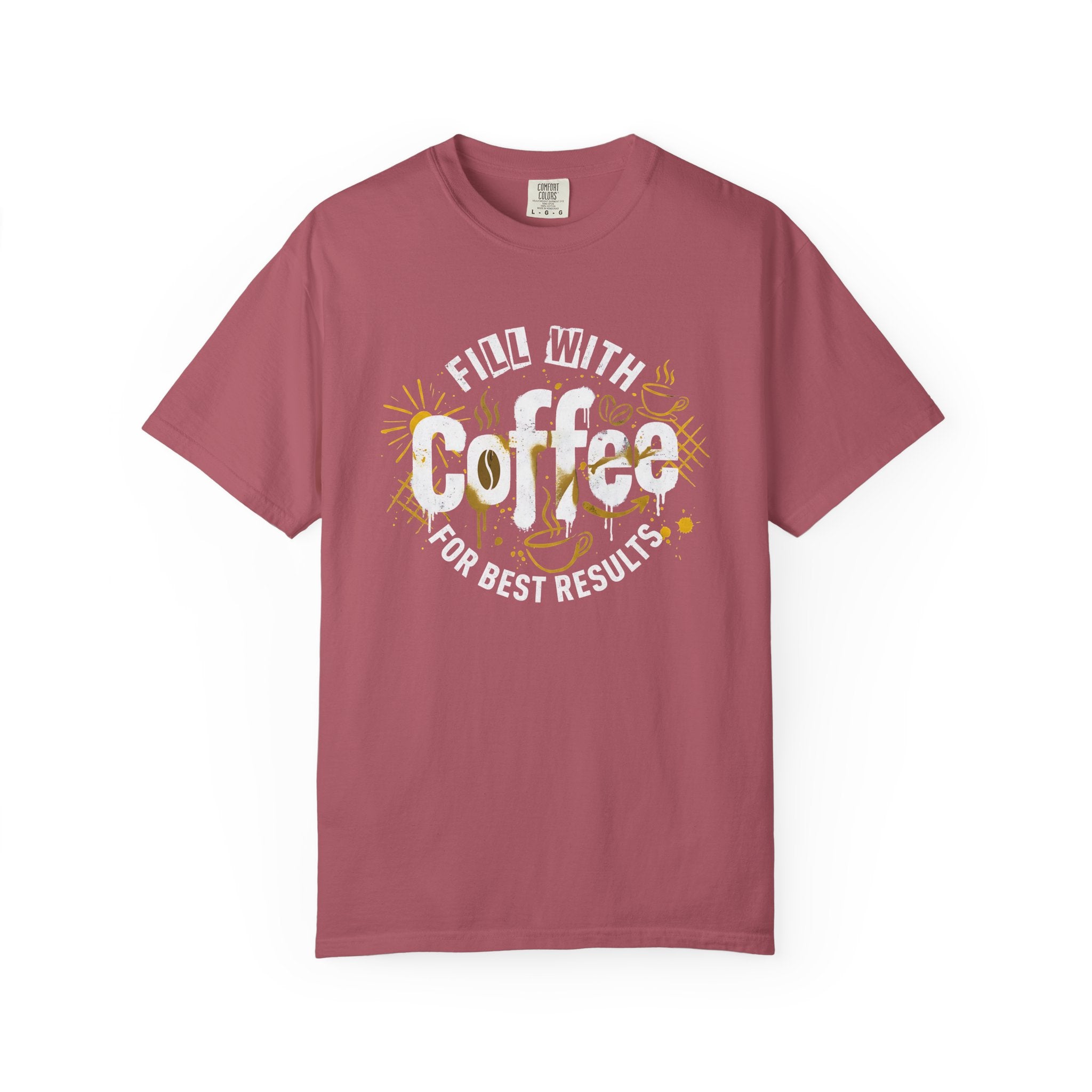A dusty rose garment-dyed t-shirt featuring a retro coffee-themed graphic on the chest.