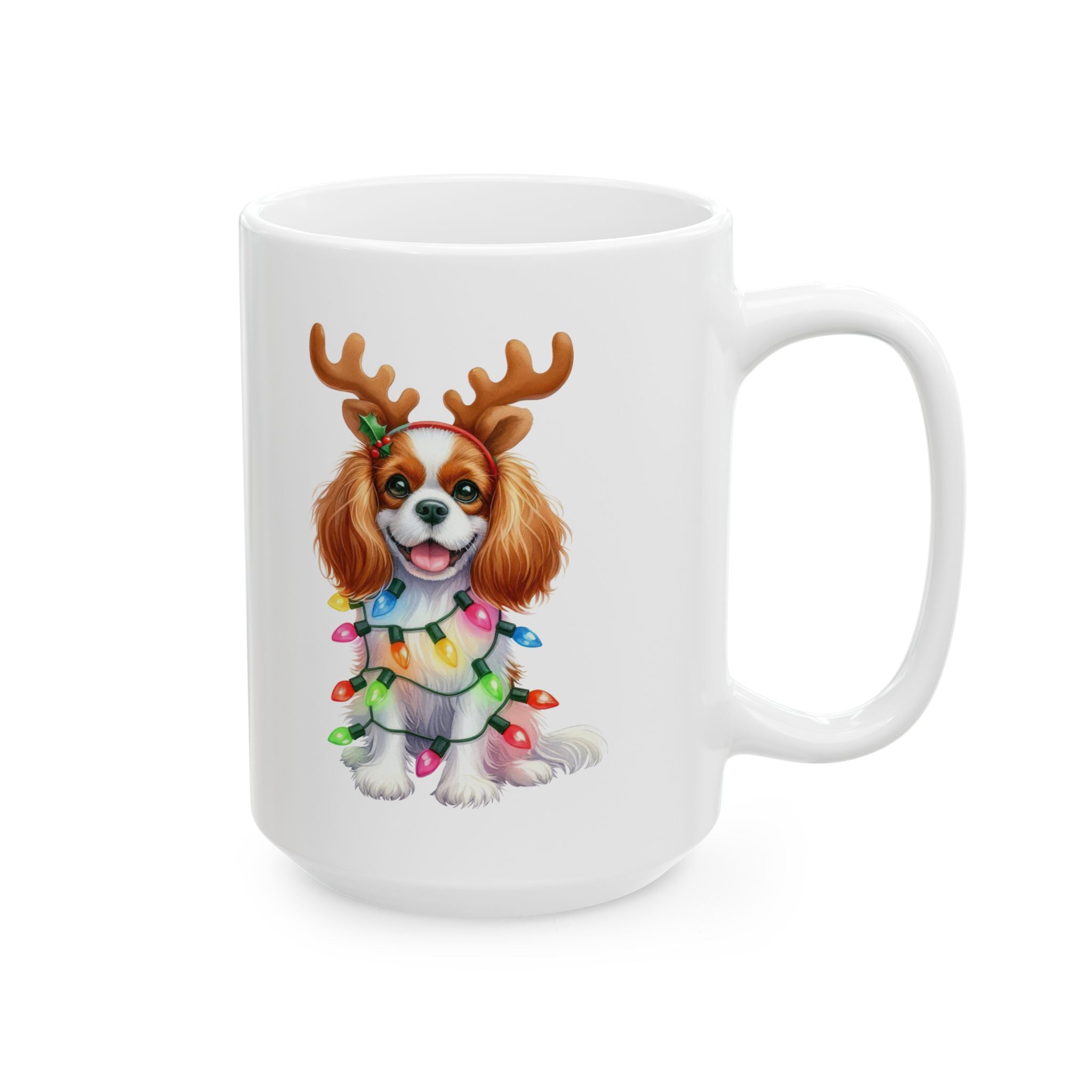 White ceramic mug with a Cavalier King Charles Spaniel wearing reindeer antlers and Christmas lights.