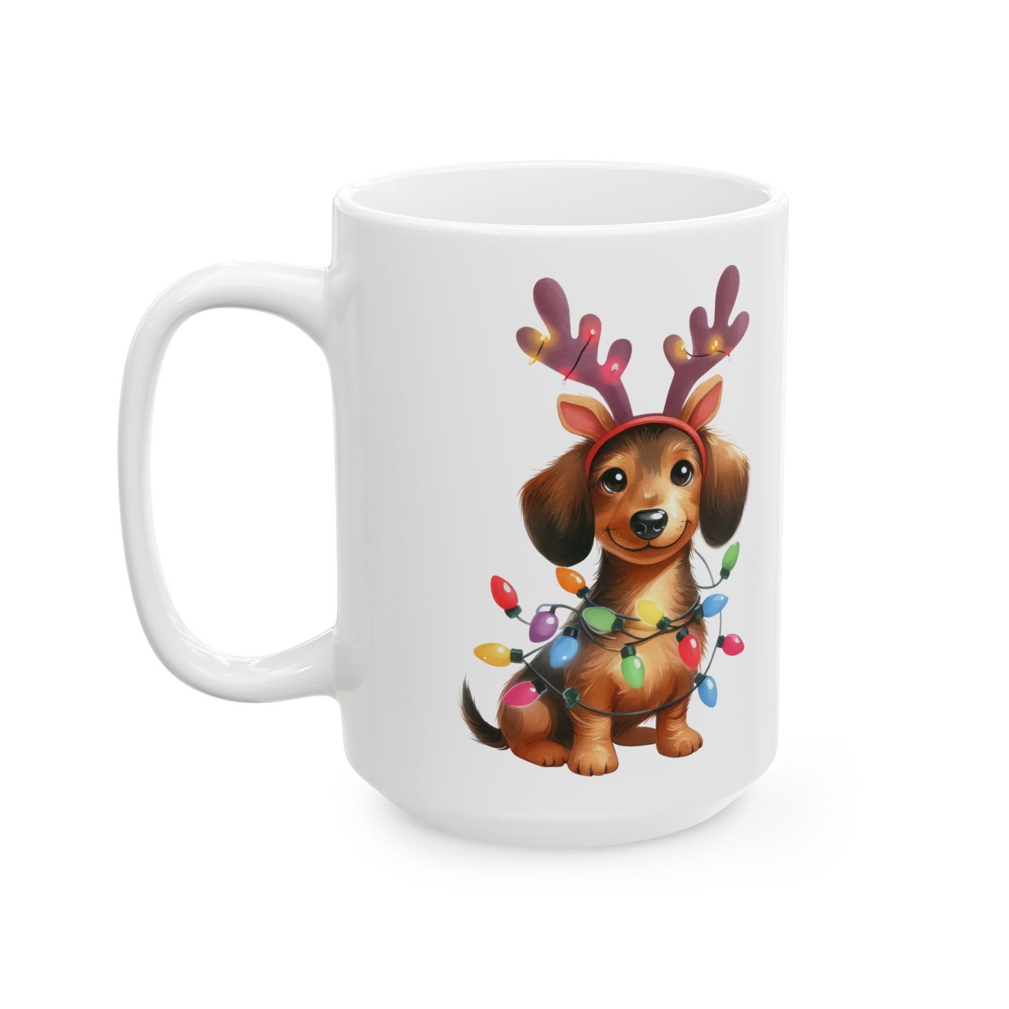 White ceramic mug with a cartoon dachshund wearing reindeer antlers and Christmas lights.