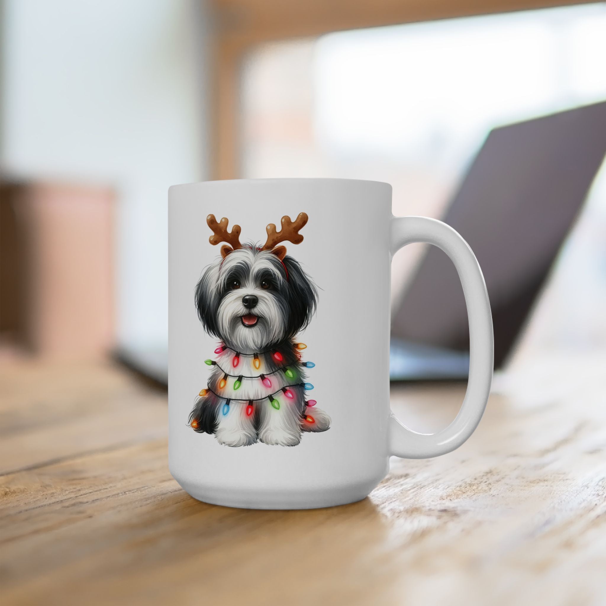 White ceramic mug with a Havanese dog wearing reindeer antlers and Christmas lights.