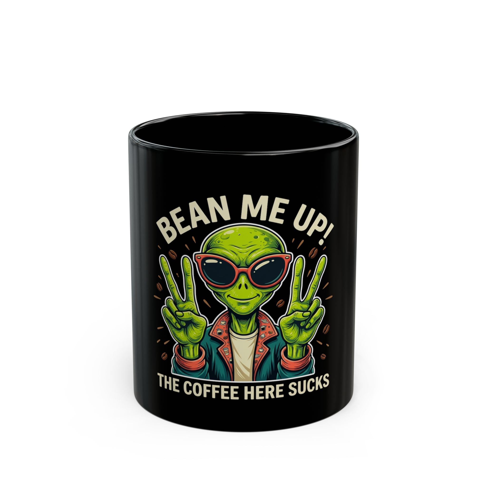 Black ceramic mug featuring a green alien wearing sunglasses and making peace signs.