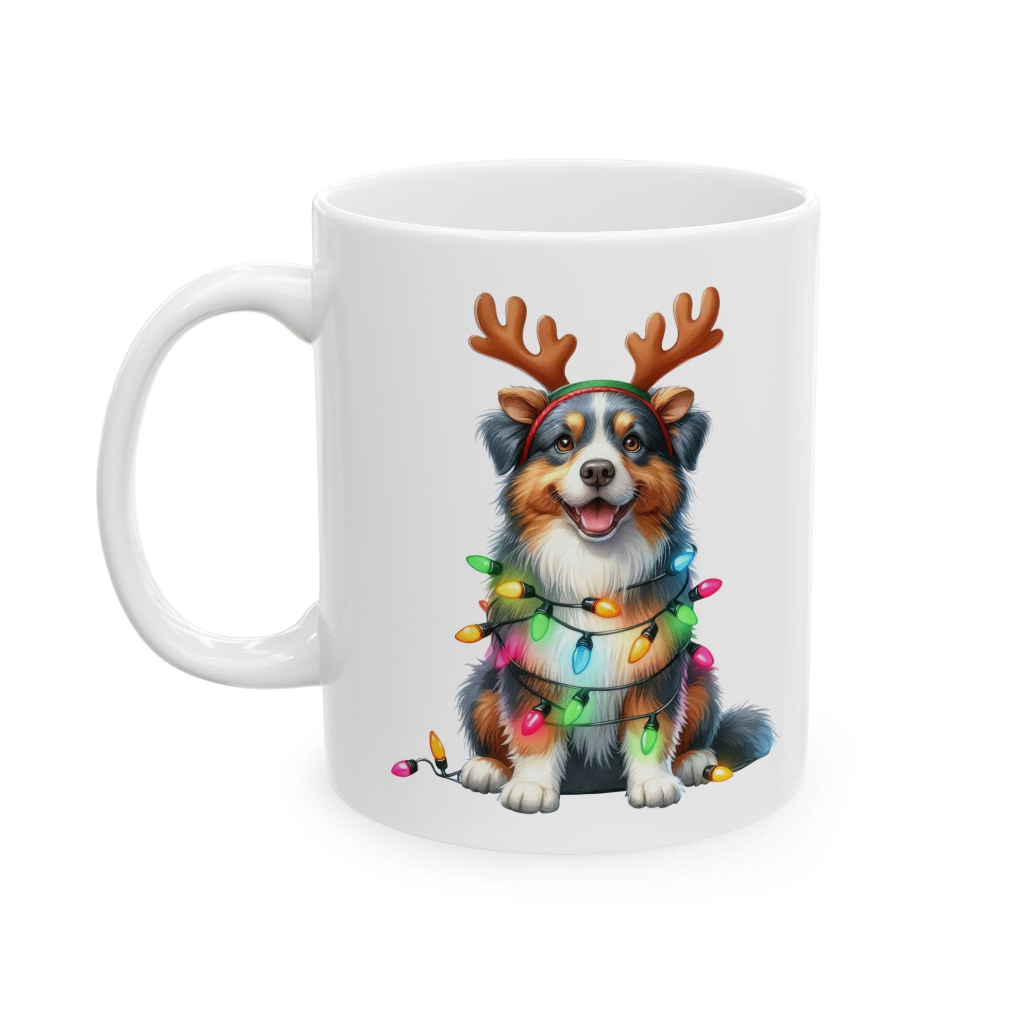 White ceramic mug featuring an Australian Shepherd wearing reindeer antlers and Christmas lights.