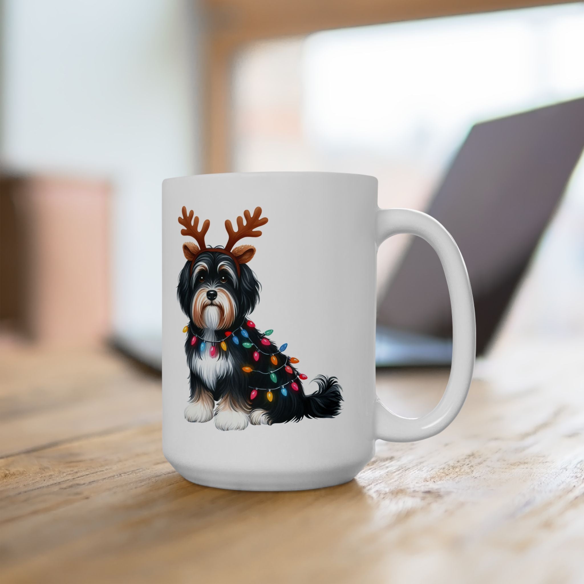 White ceramic mug featuring a Havanese dog wearing reindeer antlers and Christmas lights.