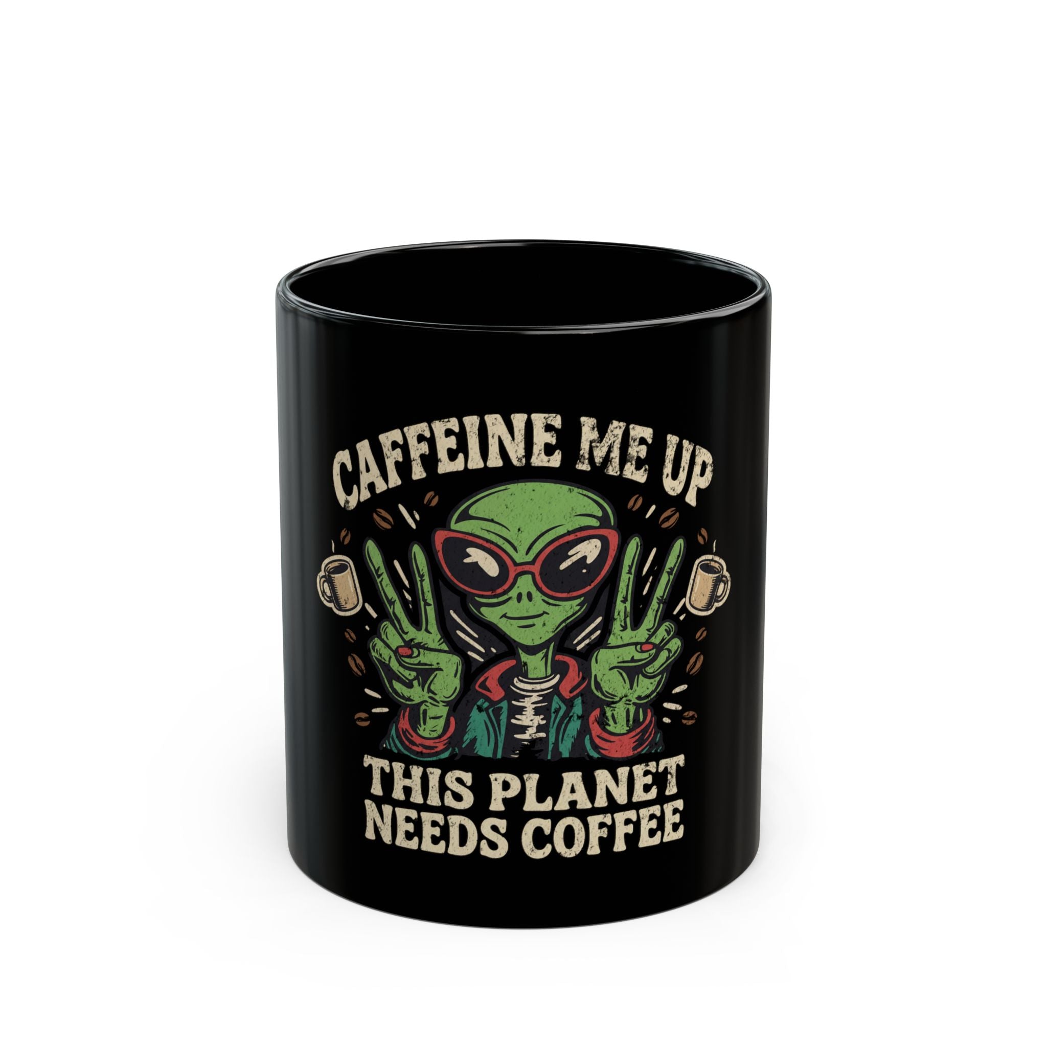 Black ceramic coffee mug featuring a green alien wearing sunglasses and making peace signs.