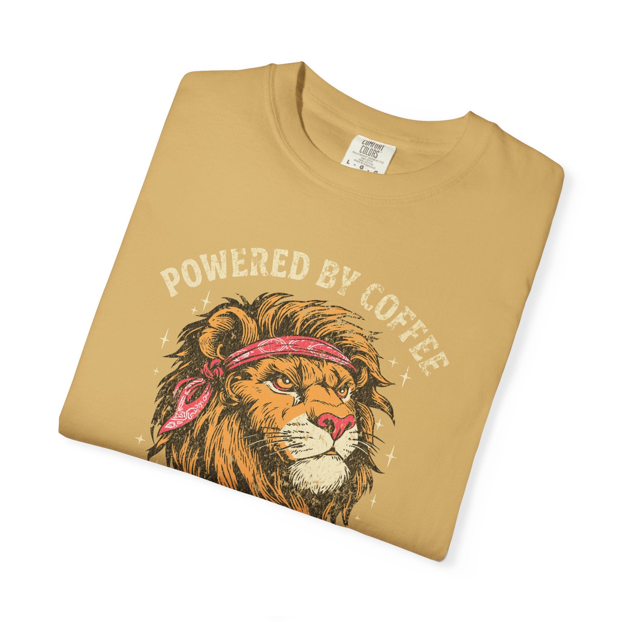Mustard yellow t-shirt featuring a distressed graphic of a lion wearing a red bandana.