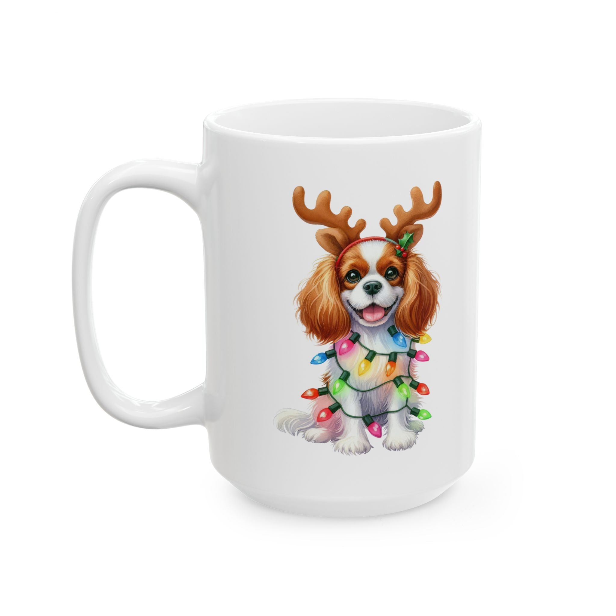 White ceramic mug featuring a Cavalier King Charles Spaniel wearing reindeer antlers and Christmas lights.