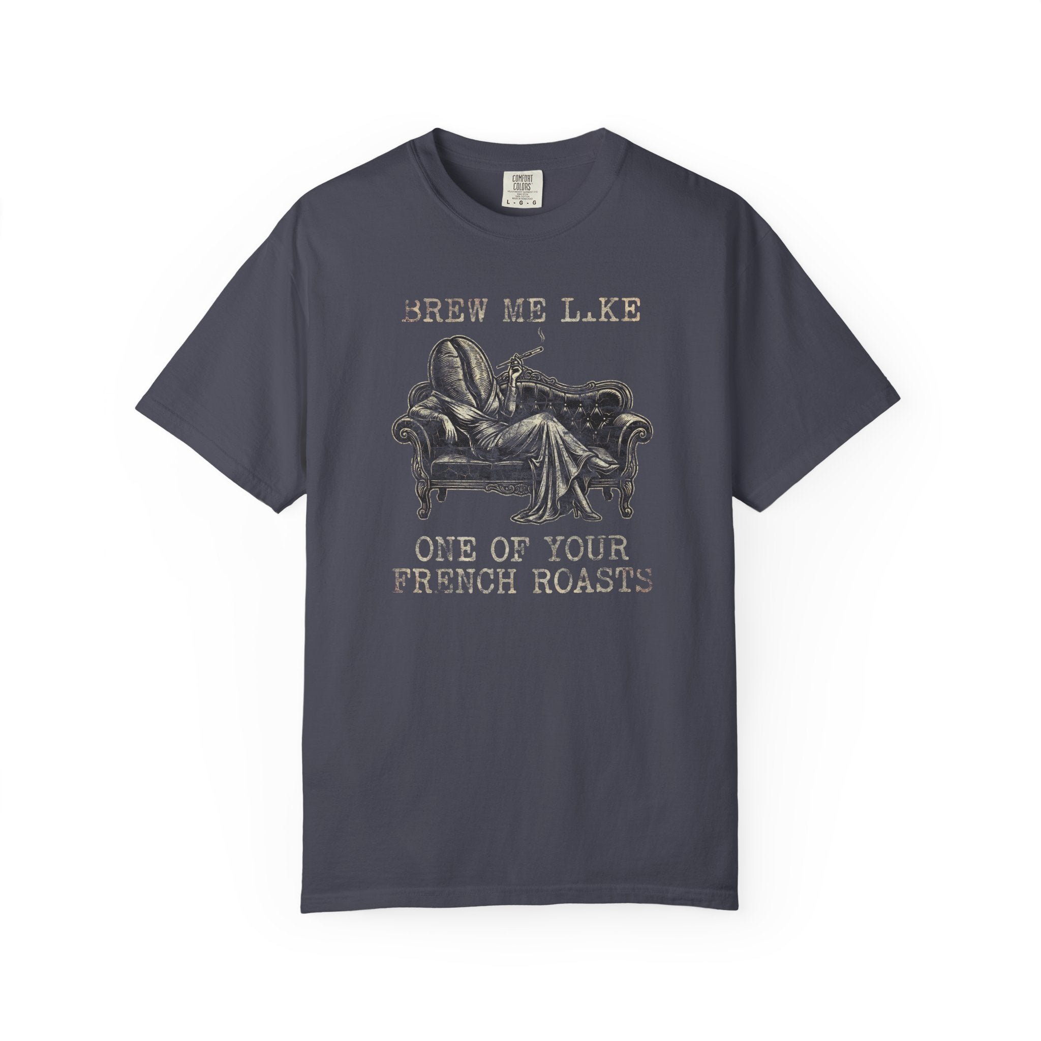 Dark grey Comfort Colors 1717 t-shirt with a coffee bean character lounging on a vintage sofa.