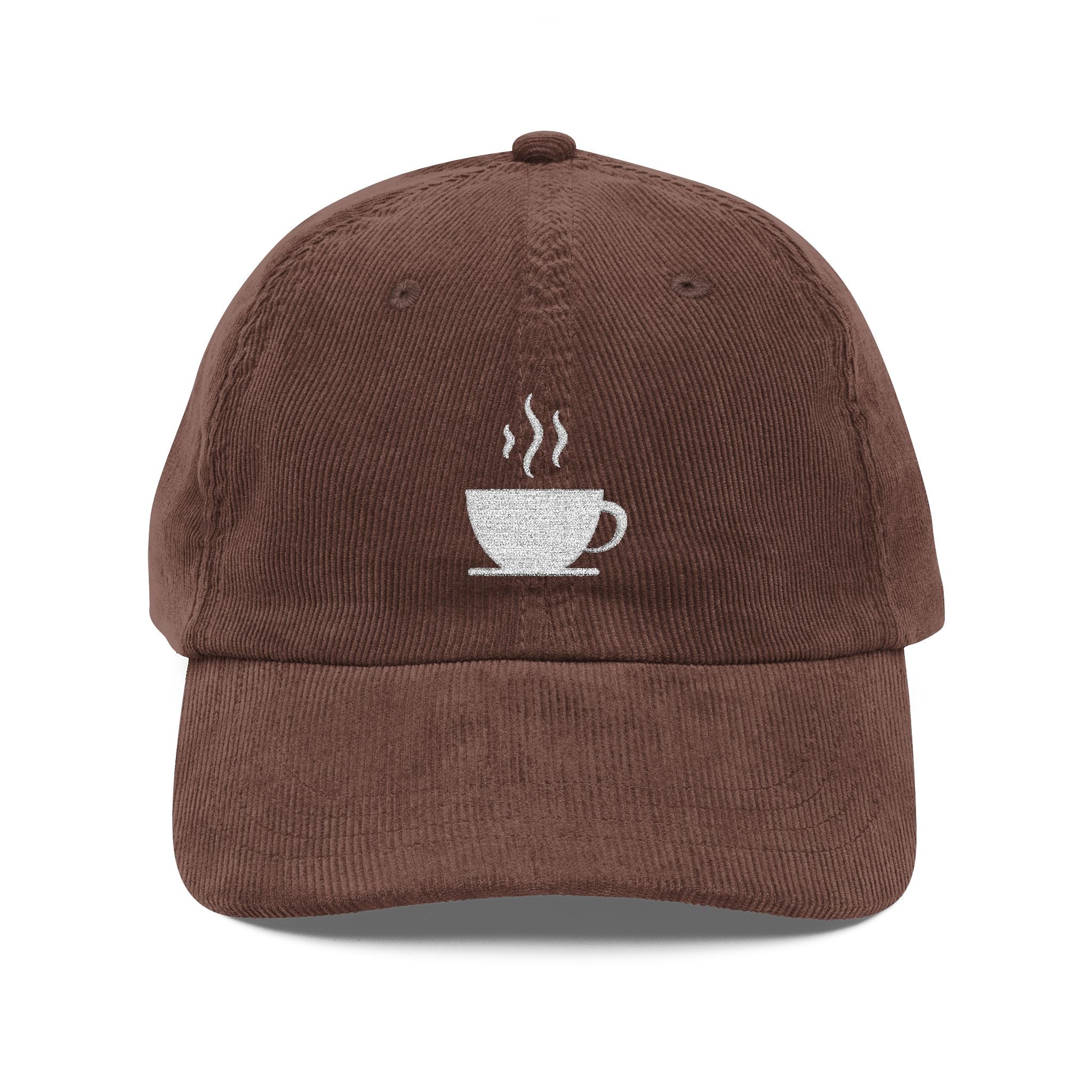 A brown corduroy dad hat featuring a minimalist white embroidered steaming coffee cup.