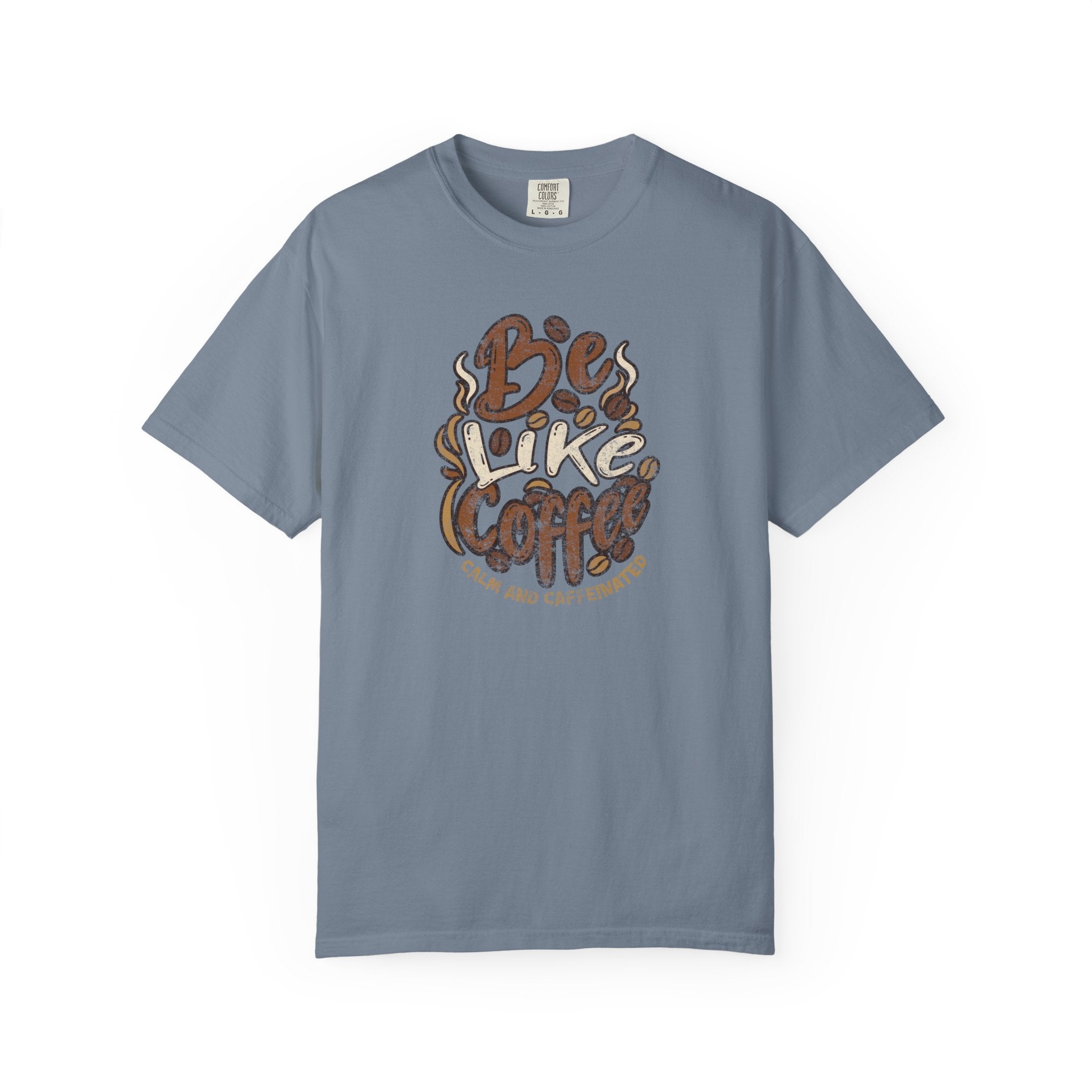 A blue short-sleeved t-shirt featuring a distressed retro graphic that says Be Like Coffee.