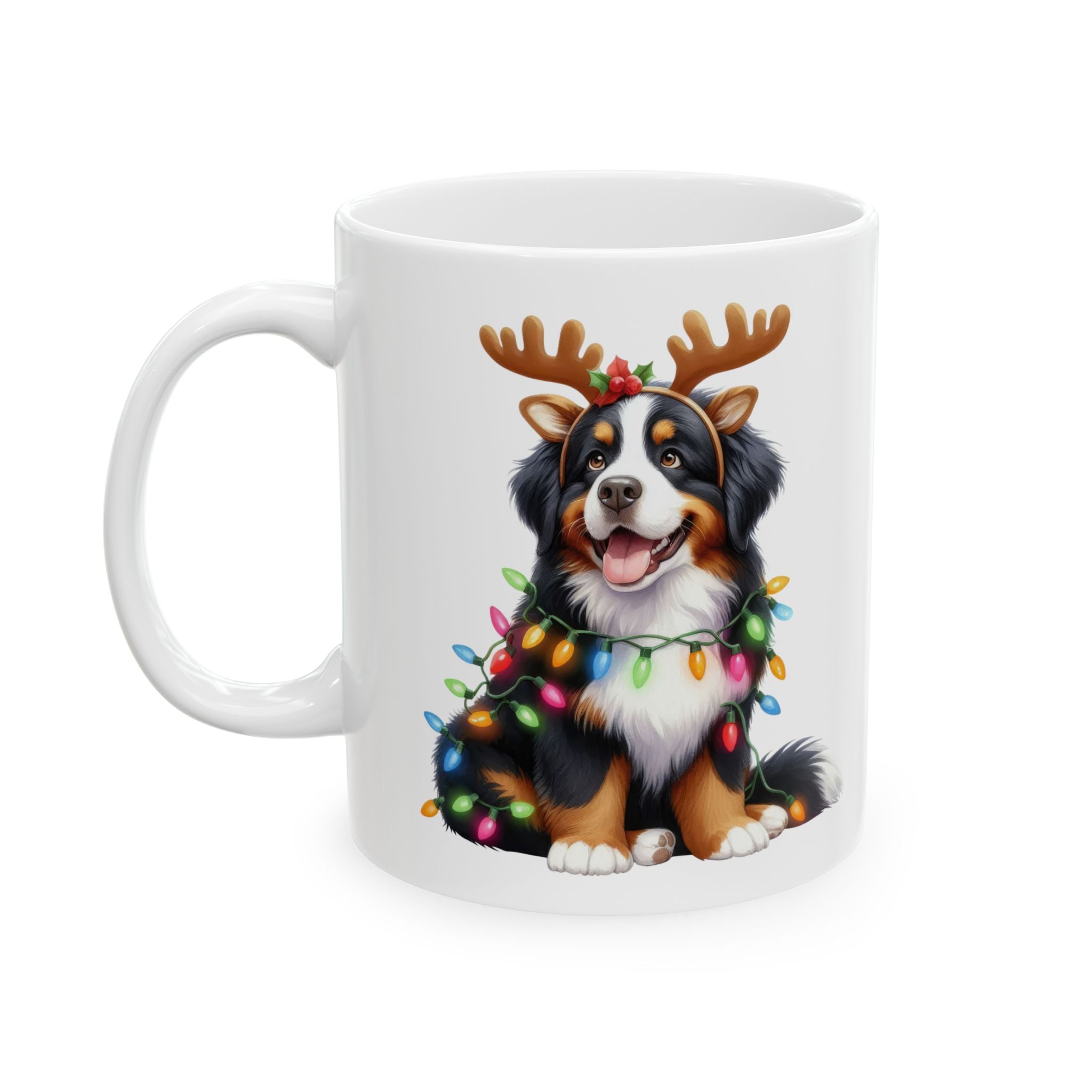 White ceramic mug featuring a Bernese Mountain Dog wearing reindeer antlers and Christmas lights.