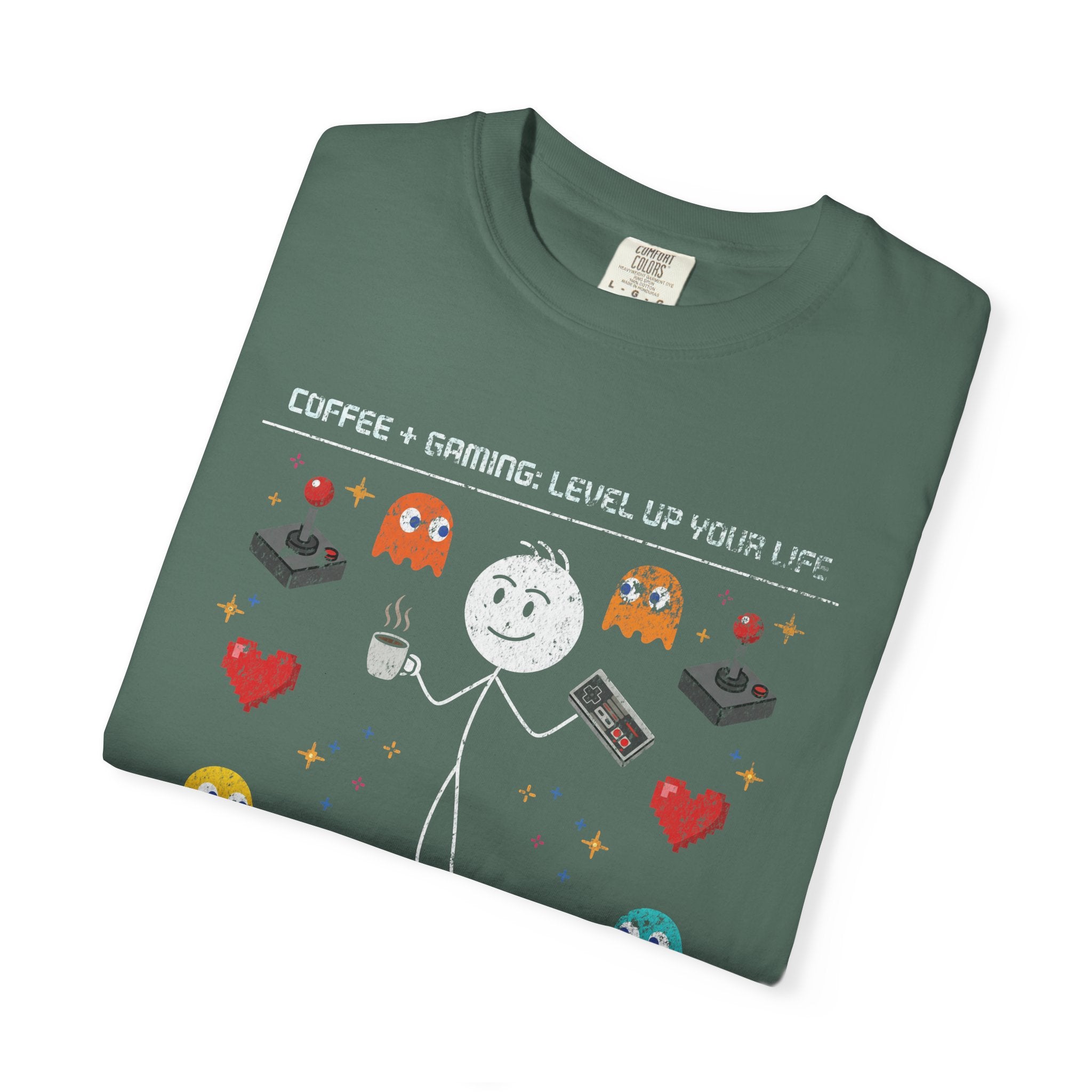 Green t-shirt with a distressed graphic of a stick figure holding coffee and a game controller.