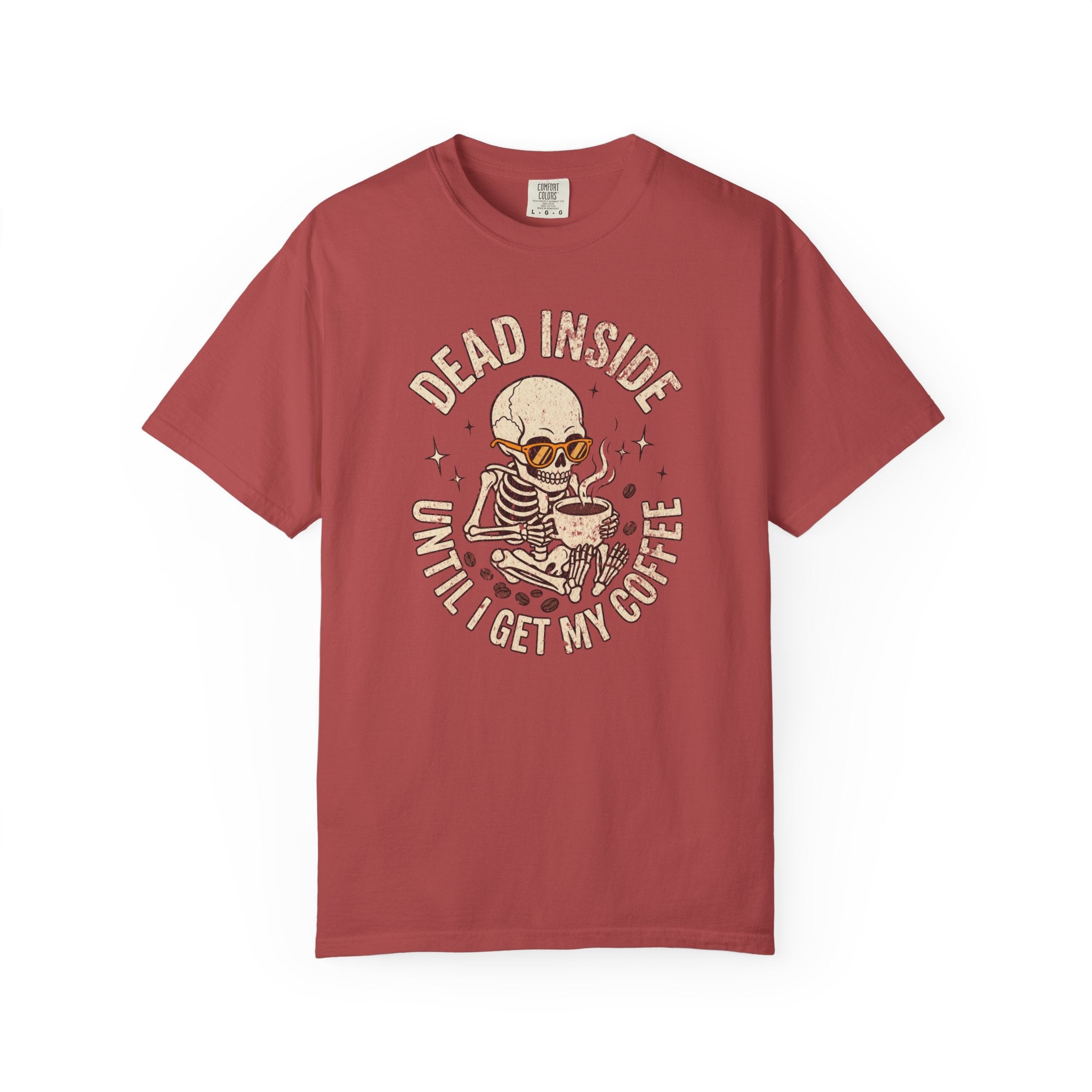 Red t-shirt featuring a skeleton wearing sunglasses and holding a steaming coffee mug.