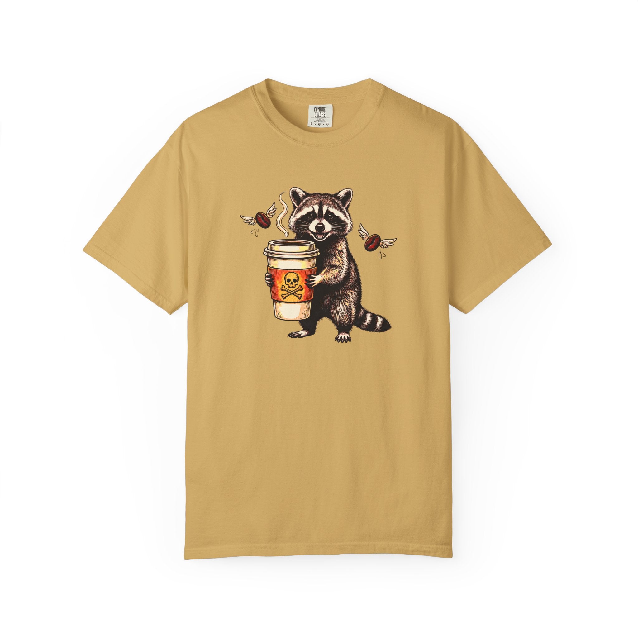 Mustard yellow Comfort Colors unisex t-shirt featuring a raccoon holding a coffee cup with a skull.