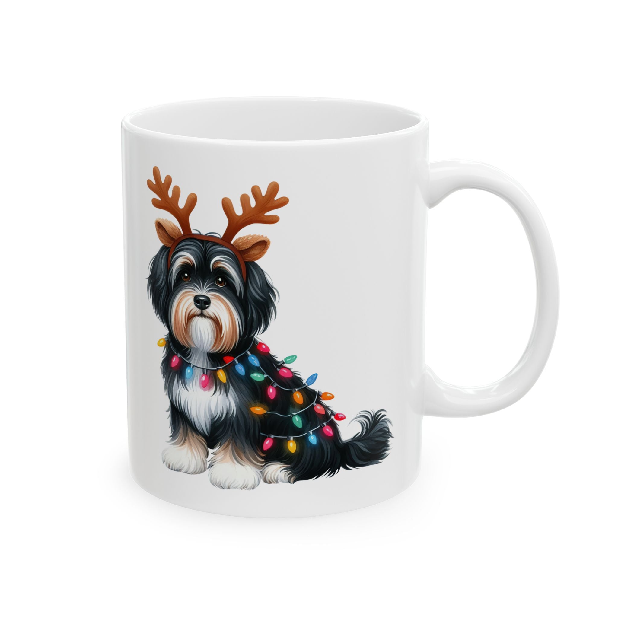 White ceramic mug featuring a Havanese dog wearing reindeer antlers and Christmas lights.