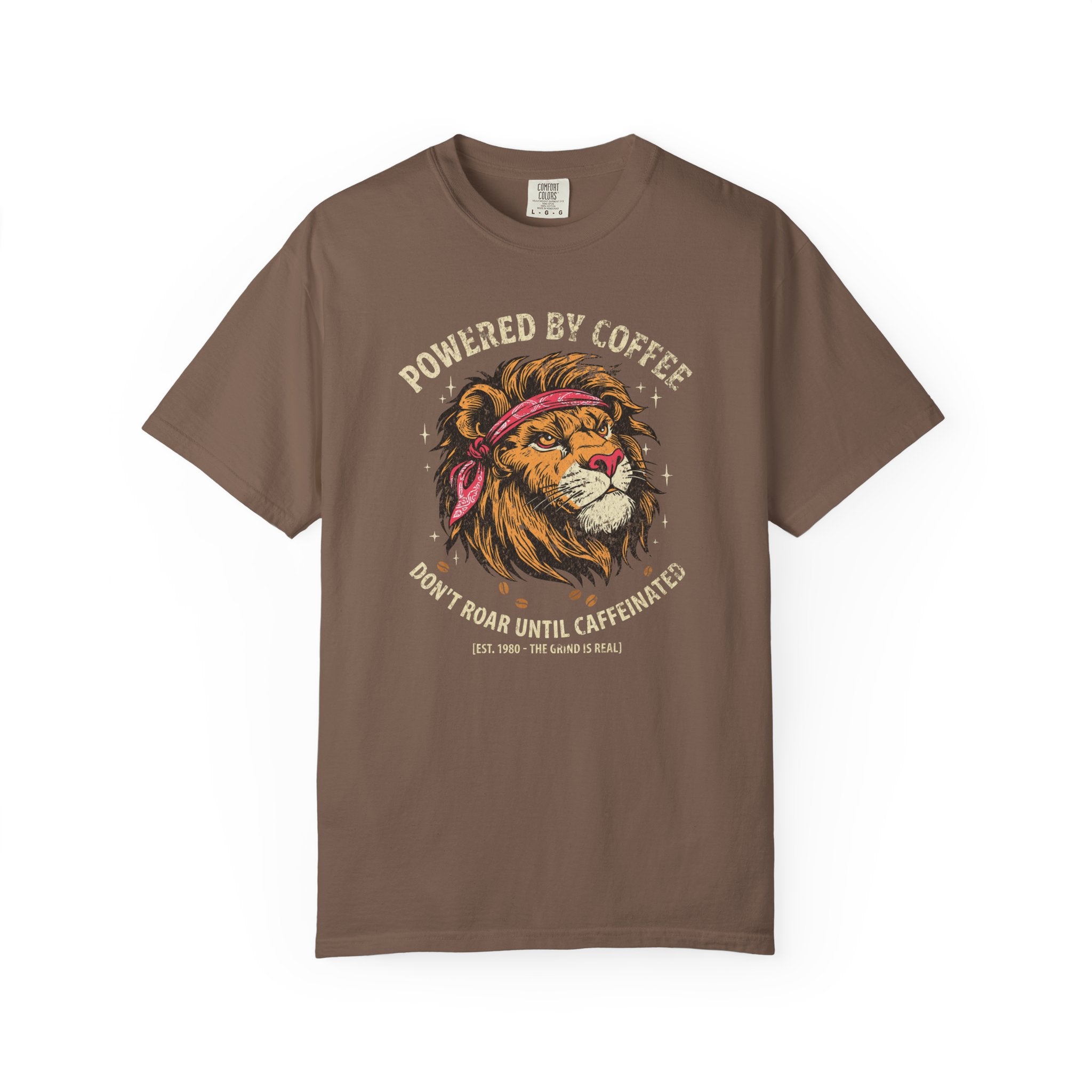 Brown t-shirt featuring a graphic of a lion wearing a bandana with the text Powered by Coffee.