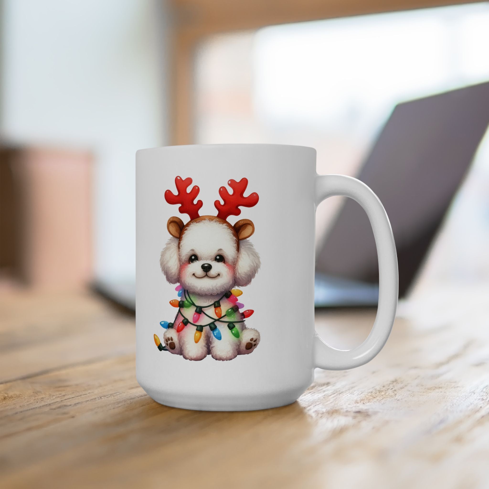 A white ceramic mug with a cute Bichon Frise wearing reindeer antlers and Christmas lights.