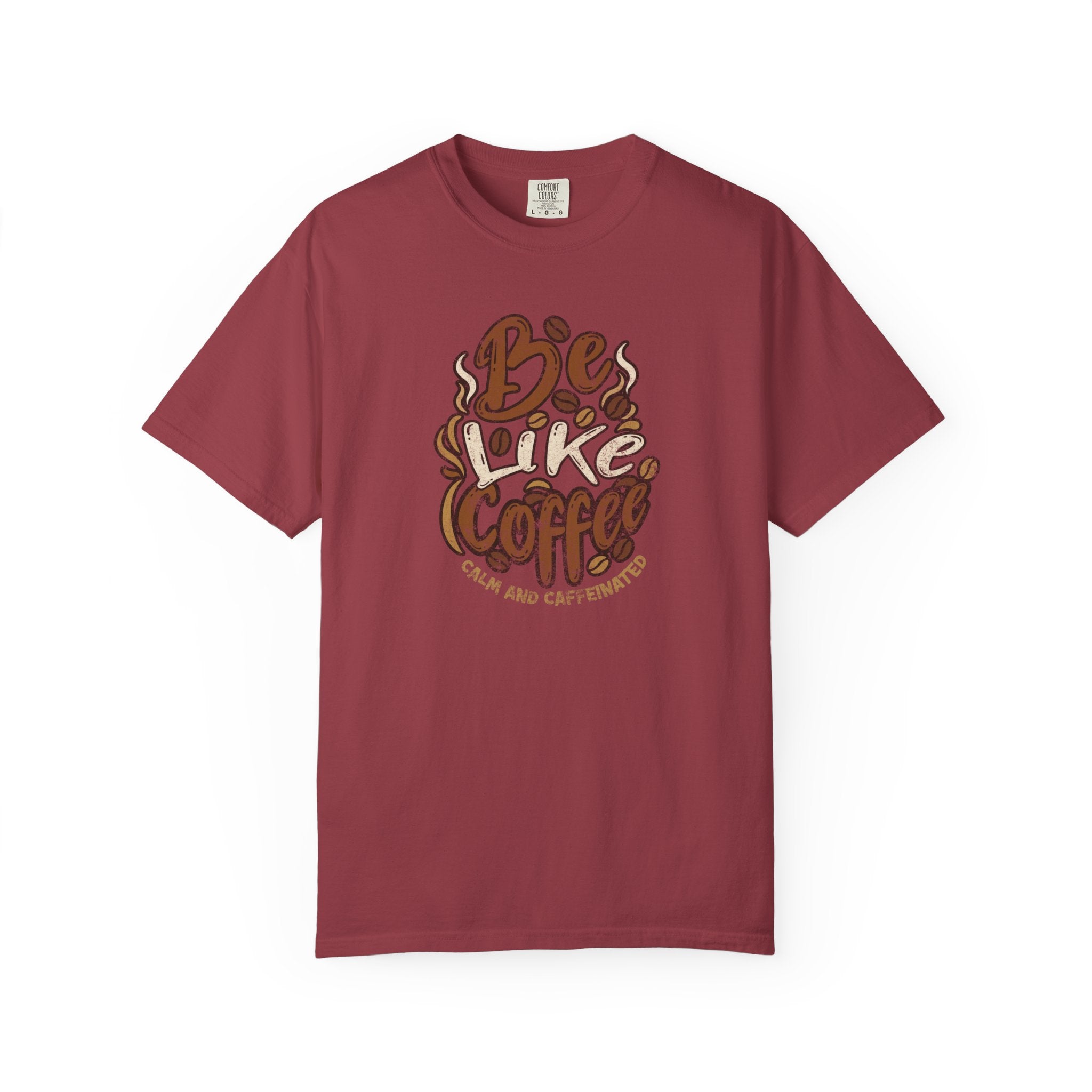 A maroon short-sleeved t-shirt featuring a retro graphic that says Be Like Coffee.