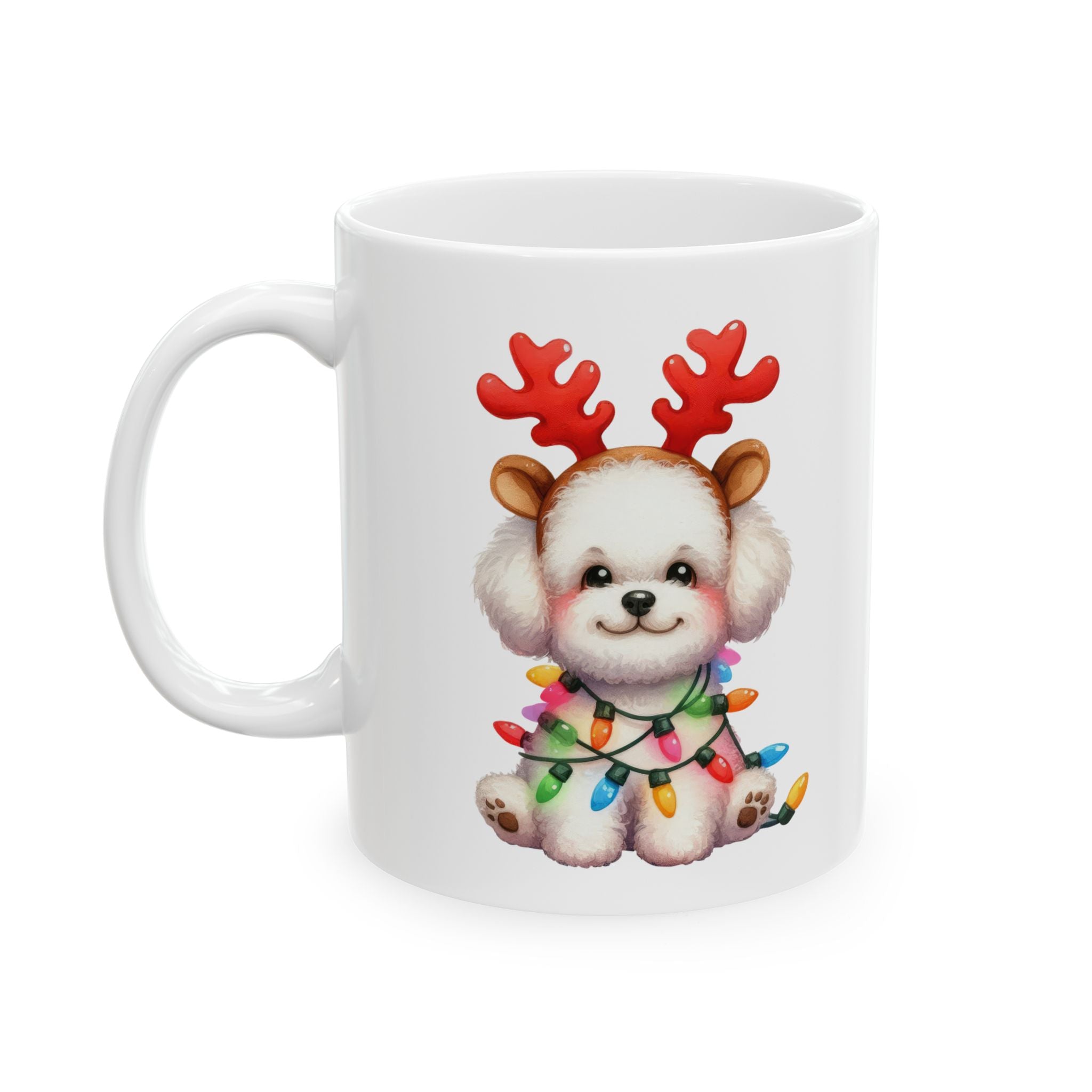 White ceramic mug featuring a cute Bichon Frise wearing reindeer antlers and Christmas lights.